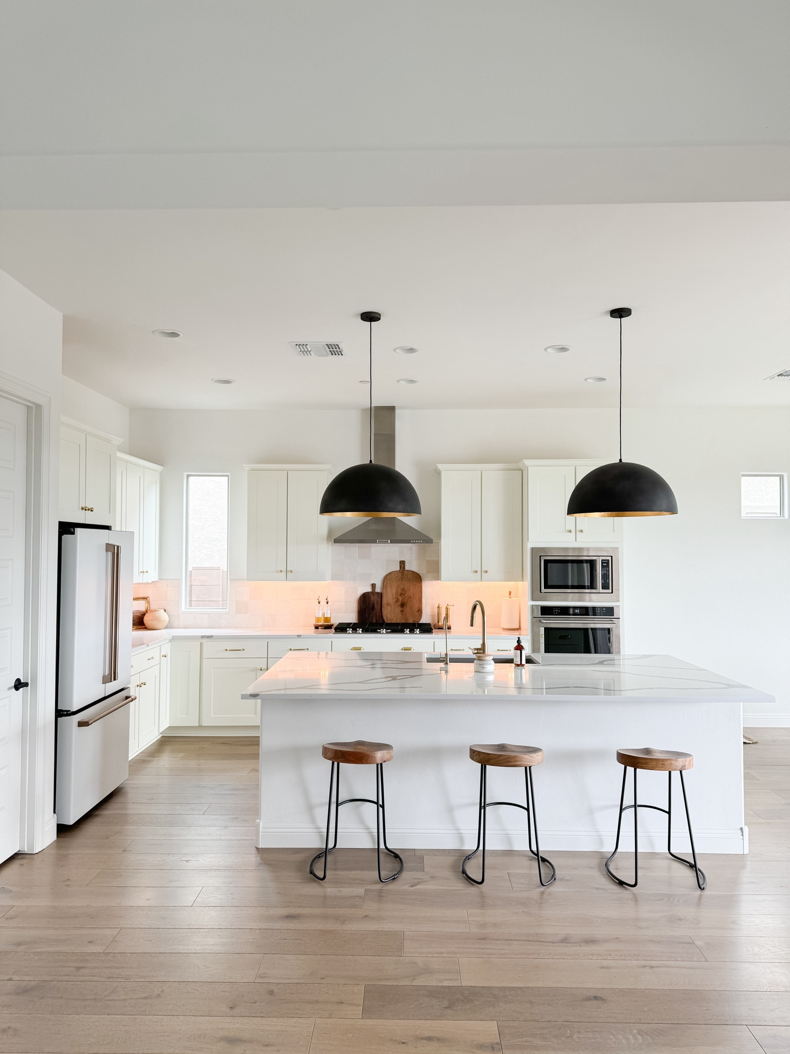 Hanging the pendant lights in the kitchen made a huge difference in the space. It helped bring contrast to this very white kitchen. I look forward to adding more contrast to the kitchen soon. 🔜 

#LTKxNSale #LTKSummerSales #LTKHome