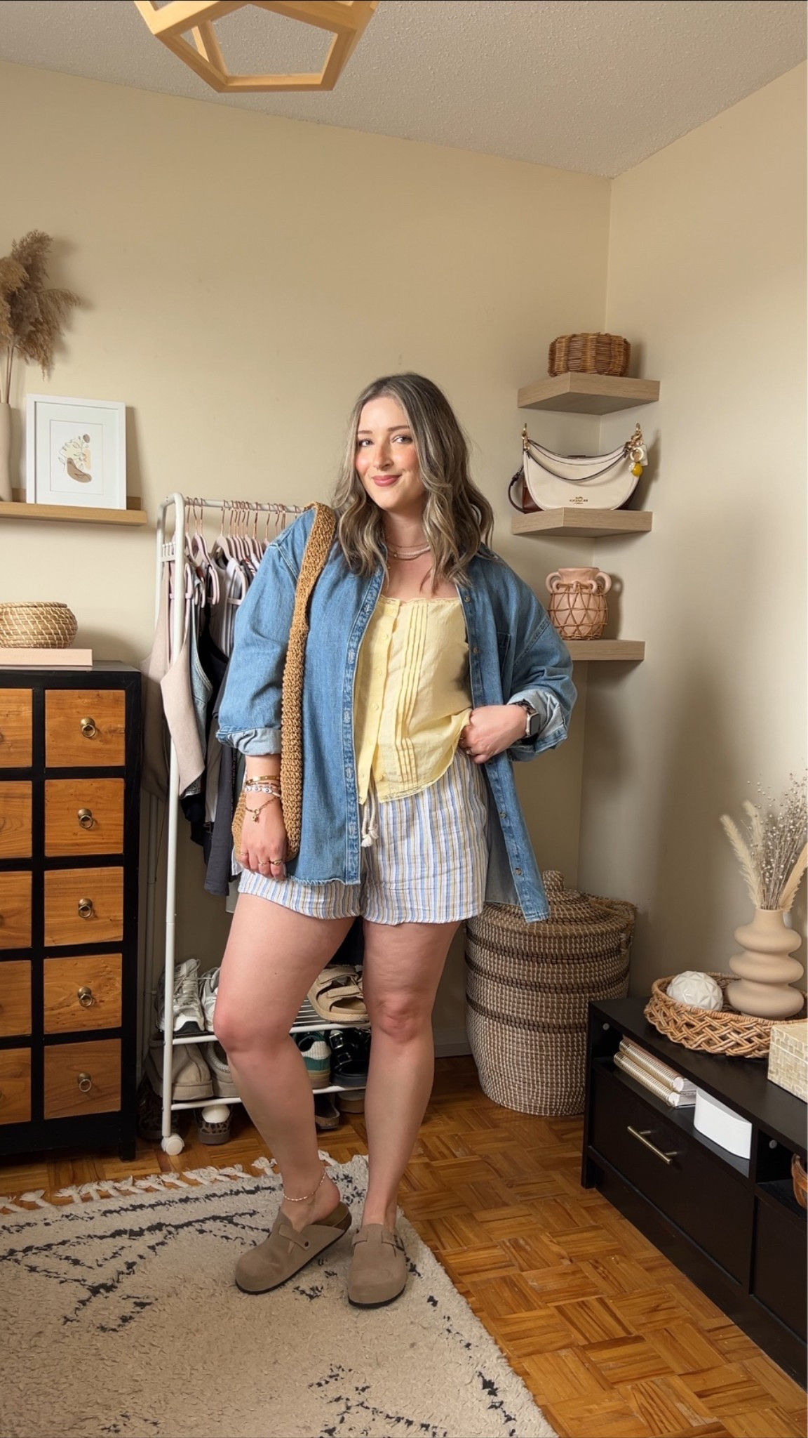 Easy summer outfit! Canadian links are under “similar products”. Wearing my usual size L in the striped shorts, butter yellow tank top, and oversized denim shirt. Straw tote bag is one of my fave Amazon finds! Linked similar clogs

#LTKsummer #LTKsale #LTKmidsize