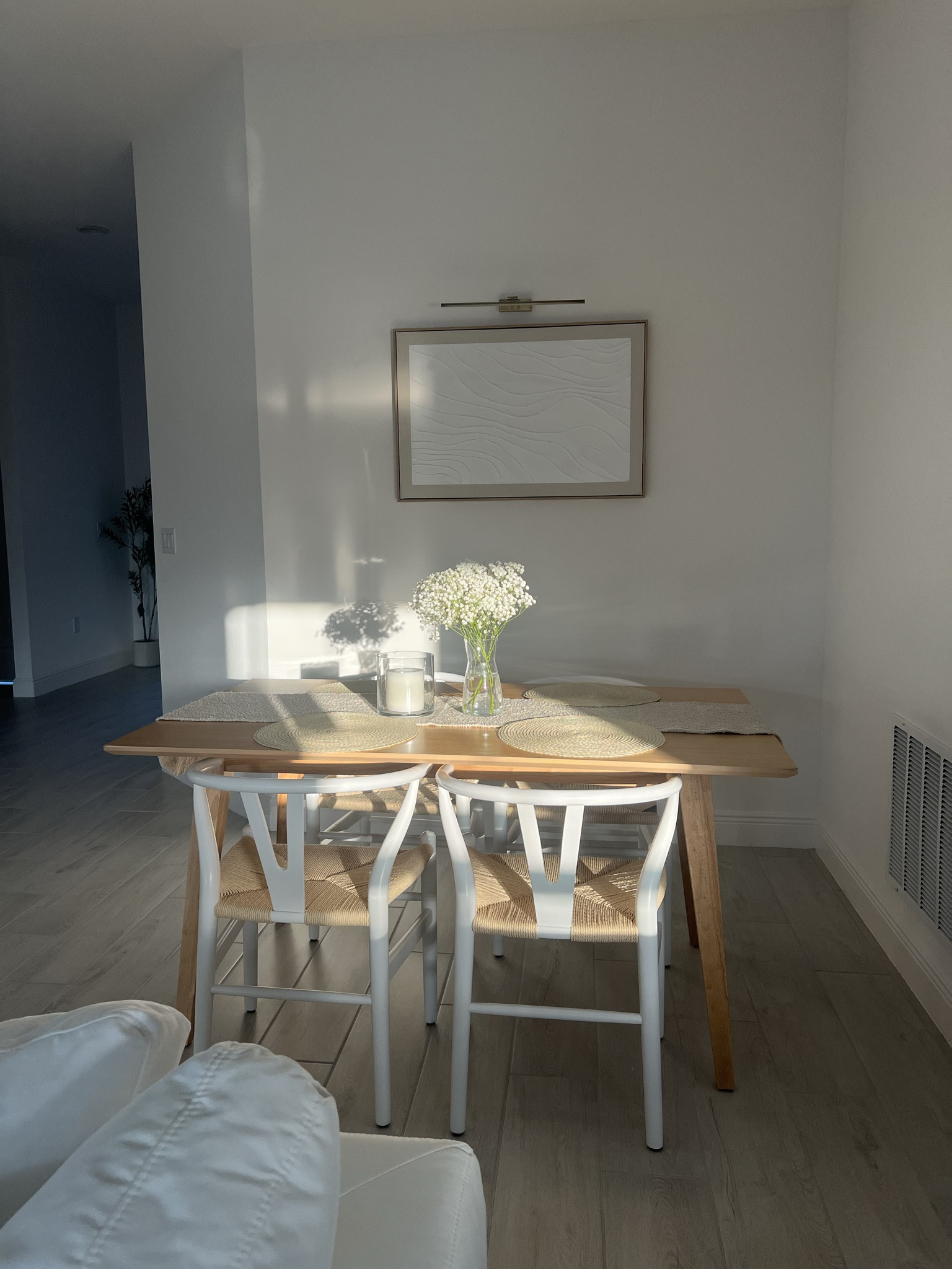dinner room inspo ~ minimalistic, clean, flowers + simple frame light, wooden table🕊️ (chairs are from amazon by STARY)

#LTKhome