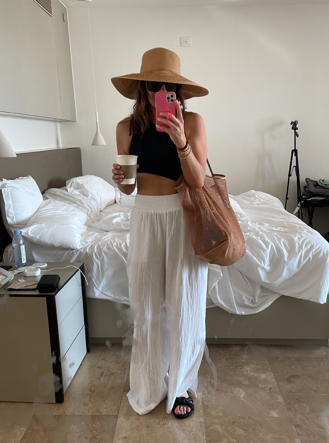 Quick mirror selfie of today’s beach attire. I was skeptical of this cut out one piece, but it’s so flattering! Aerie pool pants, beach riot bathing suit, jcrew hat, Amazon mesh bag, Amazon sunglasses, Target slides. 
