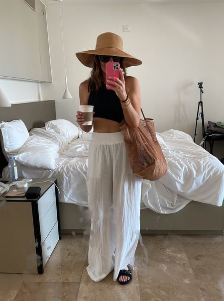 Quick mirror selfie of today’s beach attire. I was skeptical of this cut out one piece, but it’s so flattering! Aerie pool pants, beach riot bathing suit, jcrew hat, Amazon mesh bag, Amazon sunglasses, Target slides. 