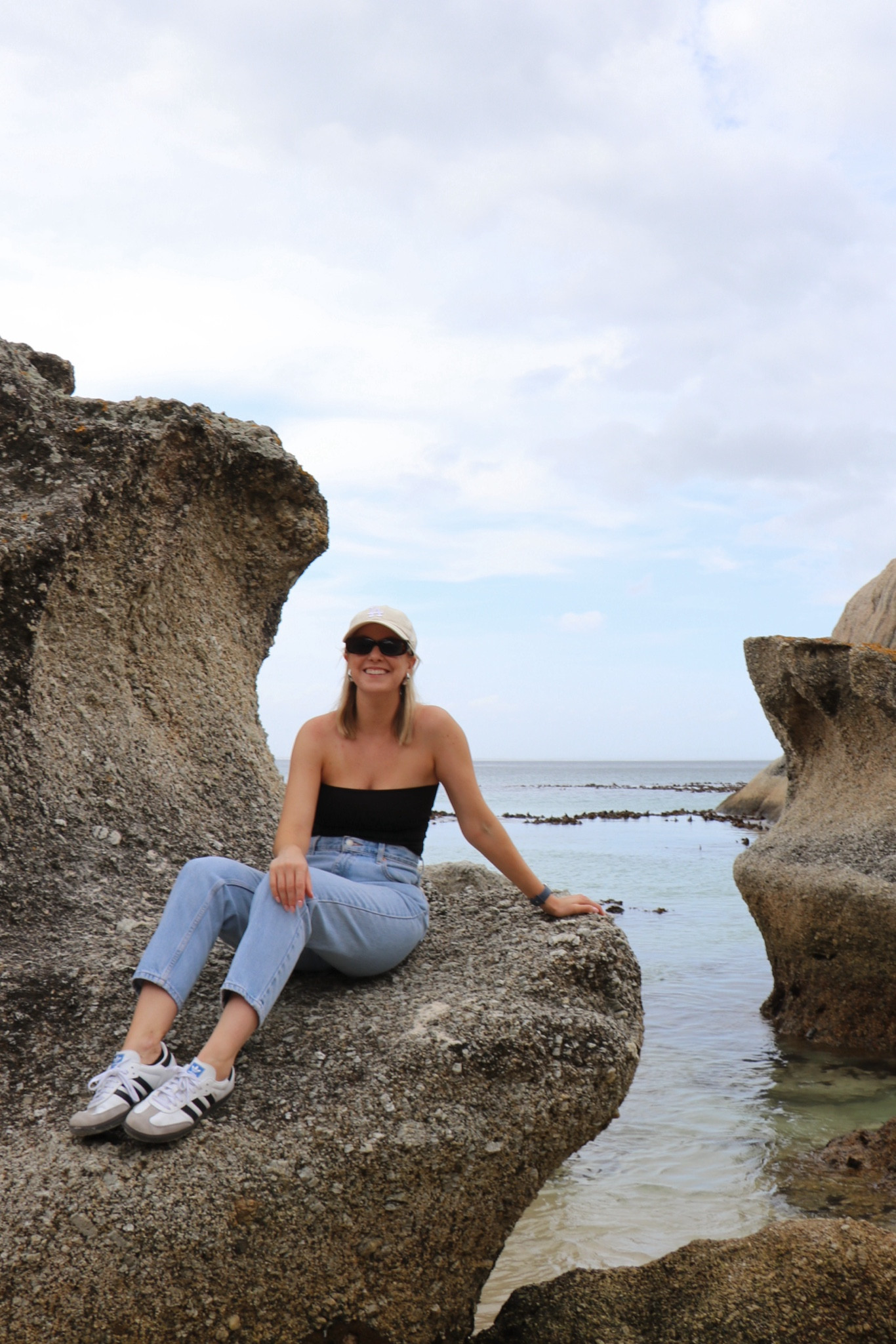 Wearing a cute black tube top that’s lined and actually stays up! Paired with vintage Levi’s jeans (similar style linked), sambas, a baseball hat, and my favorite $13 sunglasses !

#LTKstyletip #LTKfindsunder50 #LTKtravel