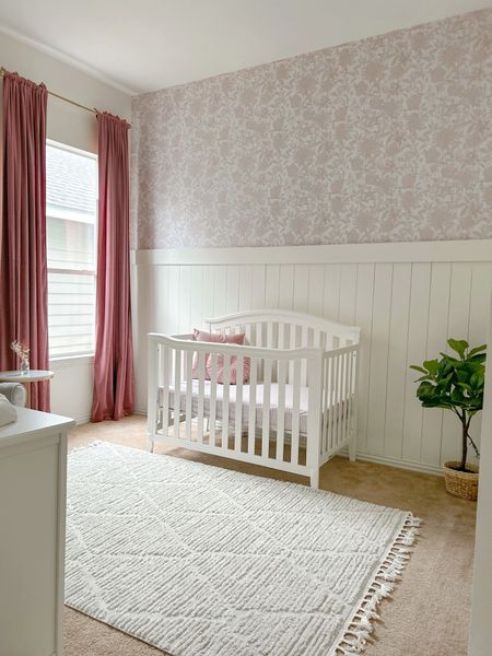 Baby girl nursery furniture & decor. Amazon curtains, pink throw pillows, floral wallpaper, beige area rug 

#LTKhome #LTKbump #LTKbaby