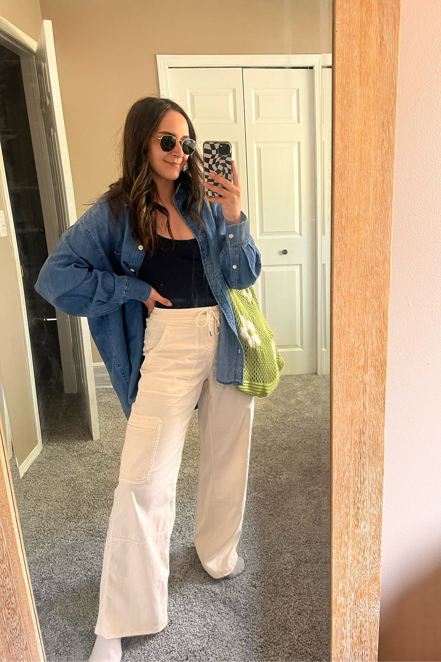 OOTD / Wearing lightweight cargo pants (size 4), bodysuit (size S), oversized denim shirt (size M) with a crochet bag. 

#LTKstyletip #LTKunder100 #LTKunder50