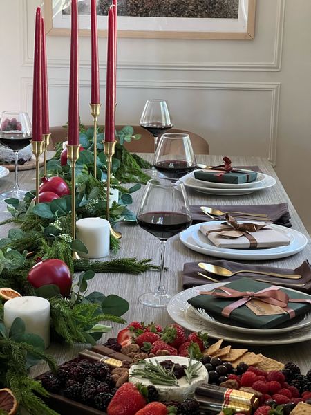 Dining room holiday table
Cream dinnerware from Potterybarn
Afloral garland
Eucalyptus garland
Pomegranate 
Red candle sticks 

#LTKhome #LTKSeasonal #LTKHoliday