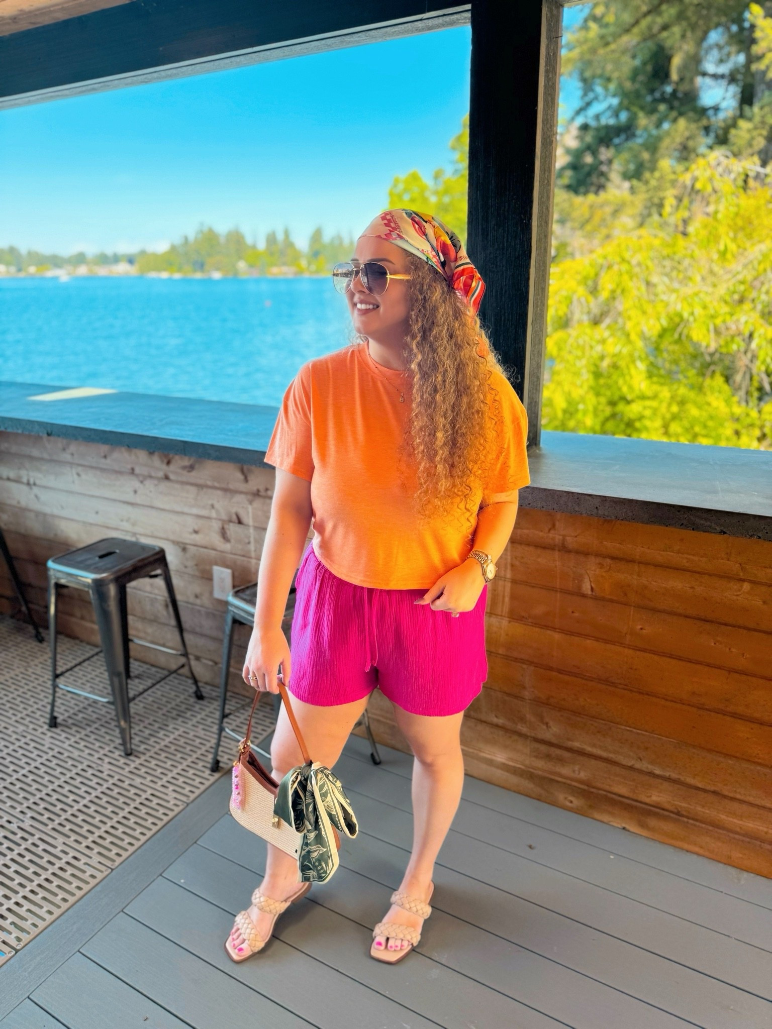 This outfit was giving tropical vacation in the best way 🌺✨ The gauzy pink shorts are so lightweight and comfy, and the printed scarf with the orange top made it feel like the perfect little dockside summer look ☀️ tropical outfit inspo | colorful summer outfit | pink gauze shorts | orange crop top | vacation outfit ideas | tropical vacation style | dockside outfit | beachy summer vibes | amazon summer purse | printed head scarf | coastal summer style | resort wear inspo | casual vacation outfit | summer accessories | feminine summer fashion | waterfront outfit ✨

#LTKootd #LTKTravel #LTKSaleAlert
