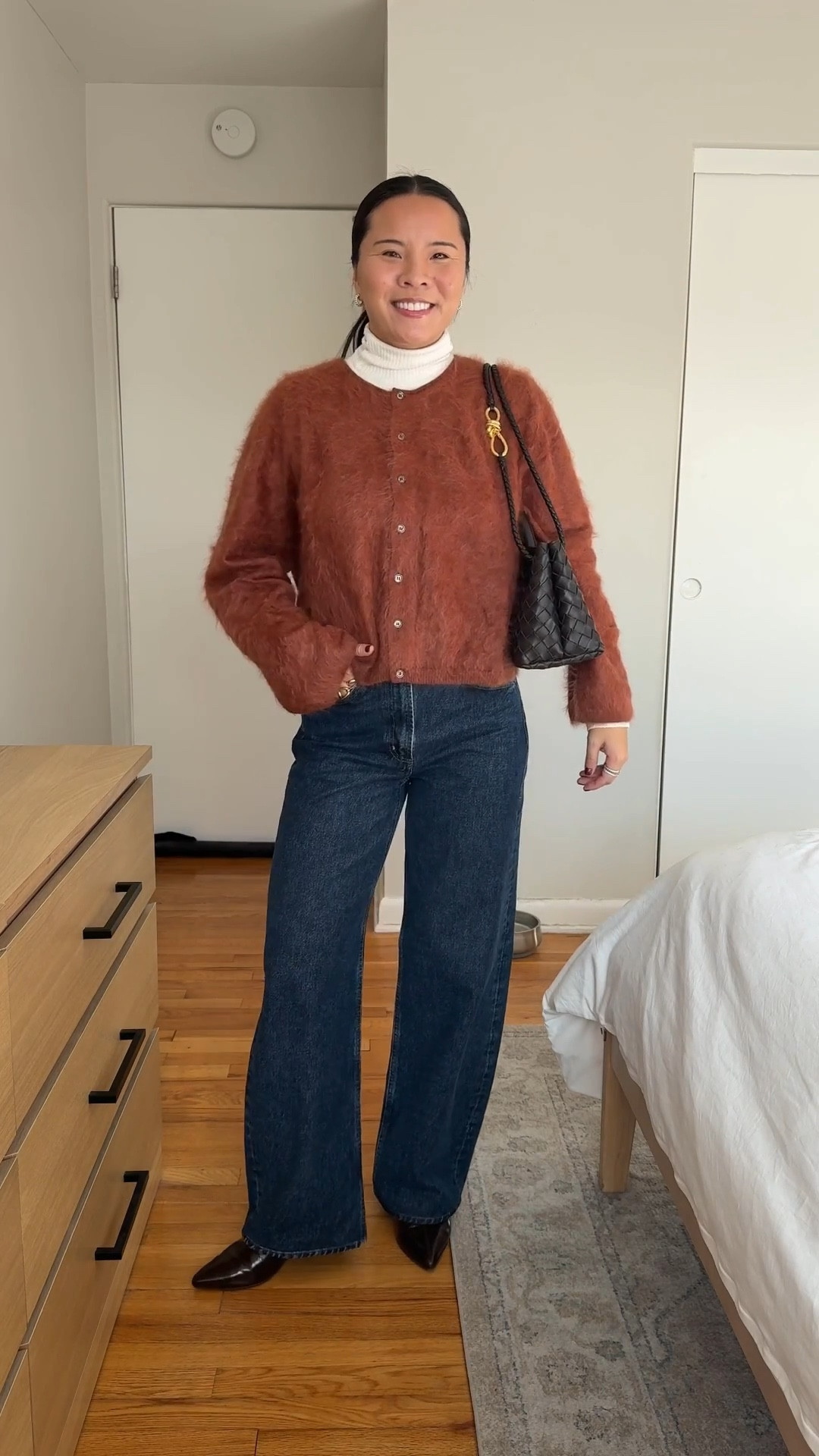 Sweater: size small
Jeans: size 24
Turtleneck: size medium