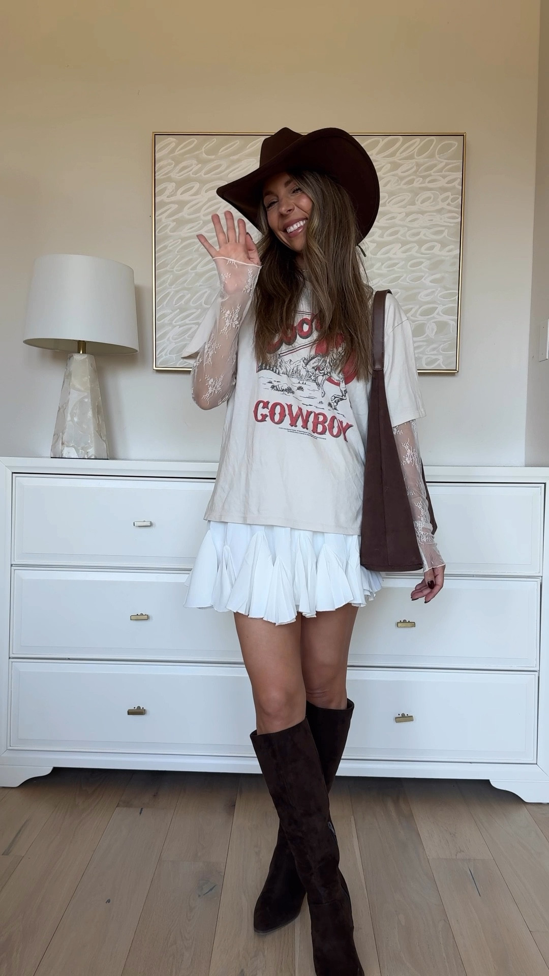 Country concert outfit! Size up in the cowboy tee. Size small skirt. Love these brown suede boots!! 

#LTKFindsUnder100 #LTKFindsUnder50 #LTKStyleTip