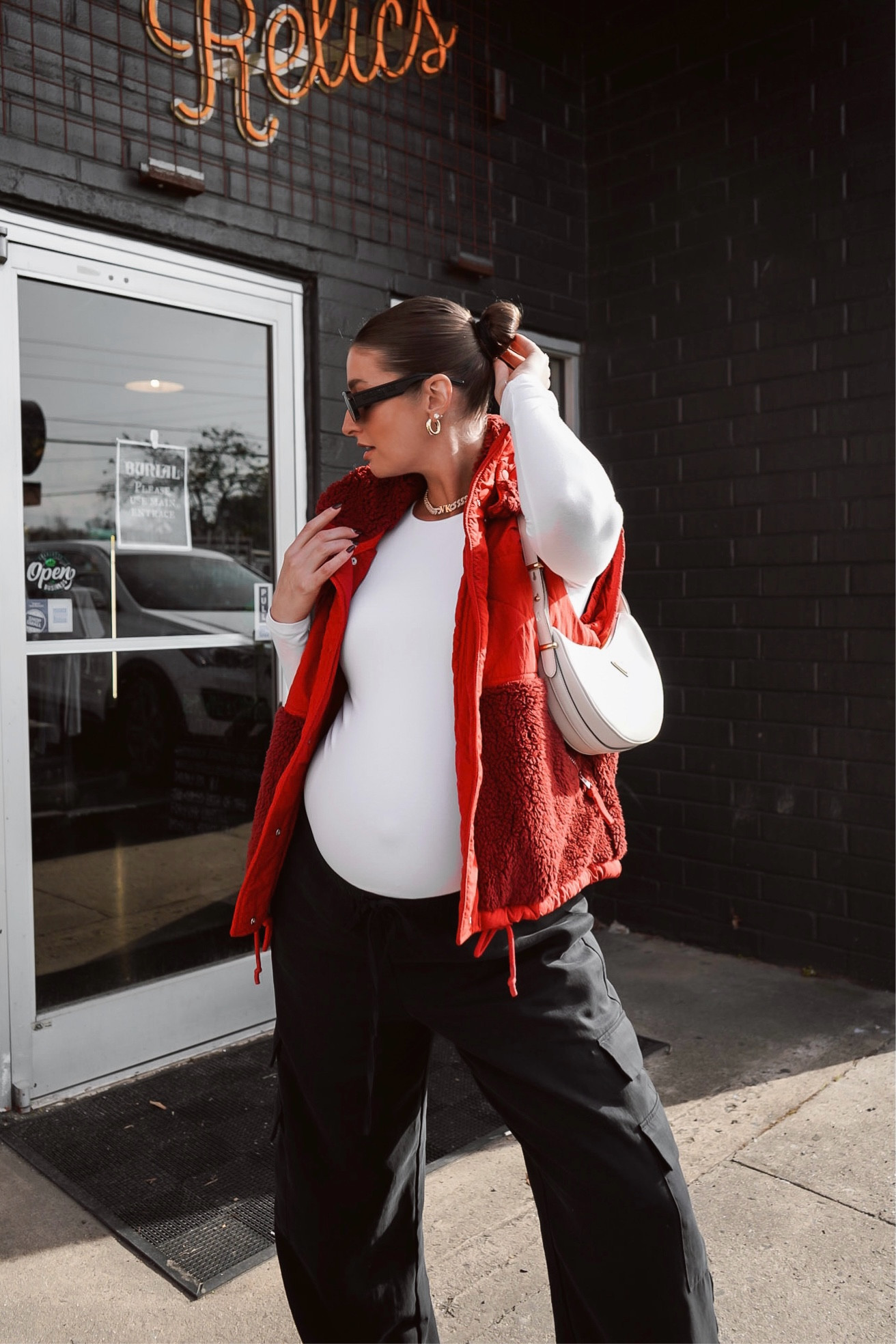 The perfect winter outfit for the bump! Not maternity, cargo pants are on crazy sale right now - wearing a size large. Top is a size small! 

#LTKStyleTip #LTKBump #LTKBaby