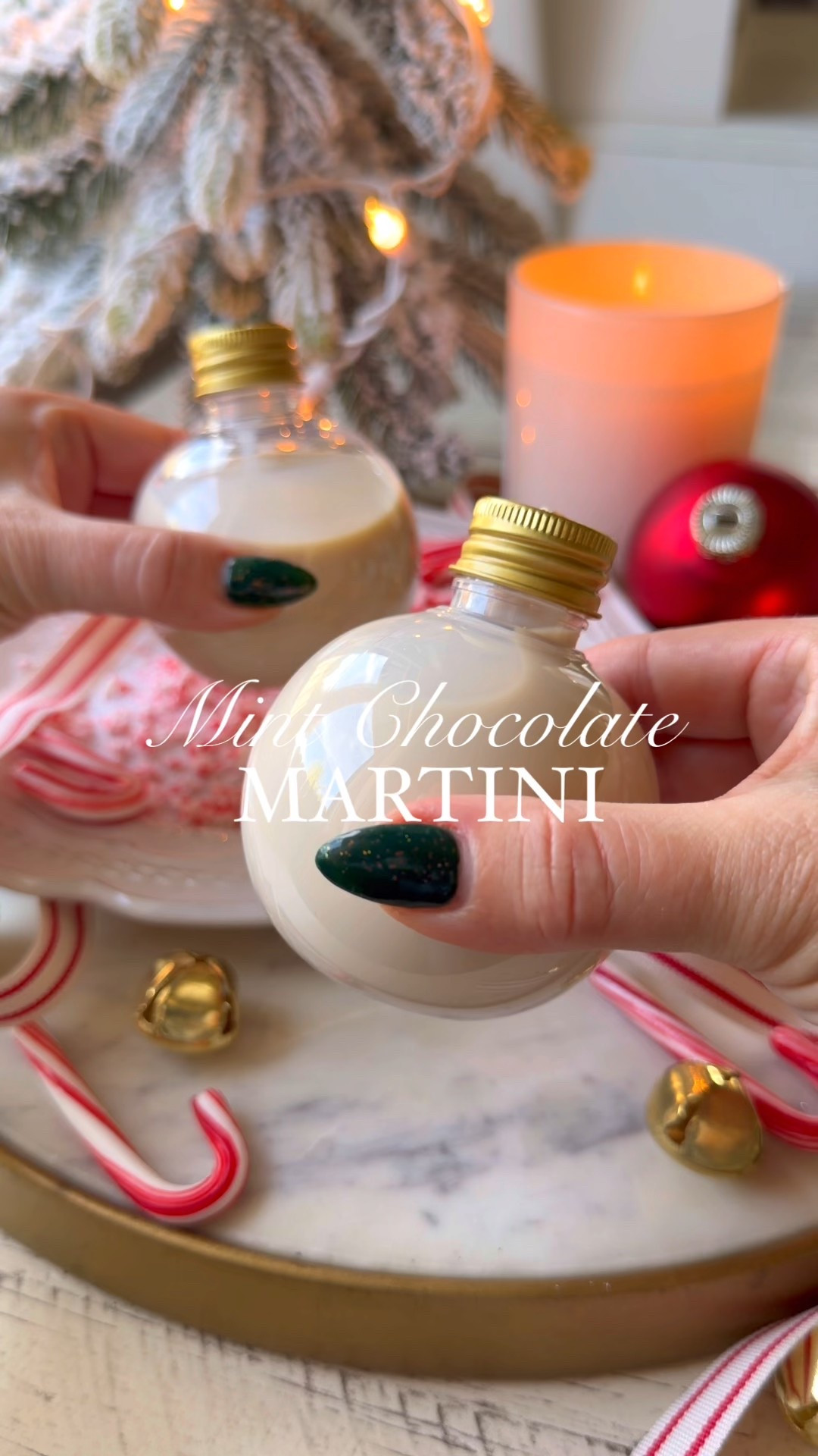 I’m shaking up Mint Chocolate Martinis, because even Mrs. Claus deserves a treat on Christmas Eve. Made with @masterofmixes_ Mint Syrup, this dessert martini is luxuriously creamy, perfectly minty, and so delicious. It’s the ultimate treat for your Christmas Eve celebration. Prep ahead and chill in individual ornaments for the cutest, most festive presentation.🎄🎄#ad #MasterofMixes #ChristmasCocktails
#peppermintmartini #ornamentini 

Mint Chocolate Martini
0.5 oz Master of Mixes Mint Syrup
1 oz Vanilla Vodka
1 oz Irish Cream
0.5 oz Creme de Cacao
2 oz Half and Half
Candy canes, for garnish
Fresh mint, for garnish

Directions:
1. Rim a coupe glass with Master of Mixes Mint Syrup and crushed candy canes, set aside.
2. In a cocktail shaker filled with ice combine mint syrup, vanilla vodka, Irish cream, creme de cacao
and half & half.
3. Shake until well chilled before straining into prepared glass.
4. Garnish with a mini candy cane and sprig of mint

#LTKfoodie #LTKSeasonal #LTKHoliday