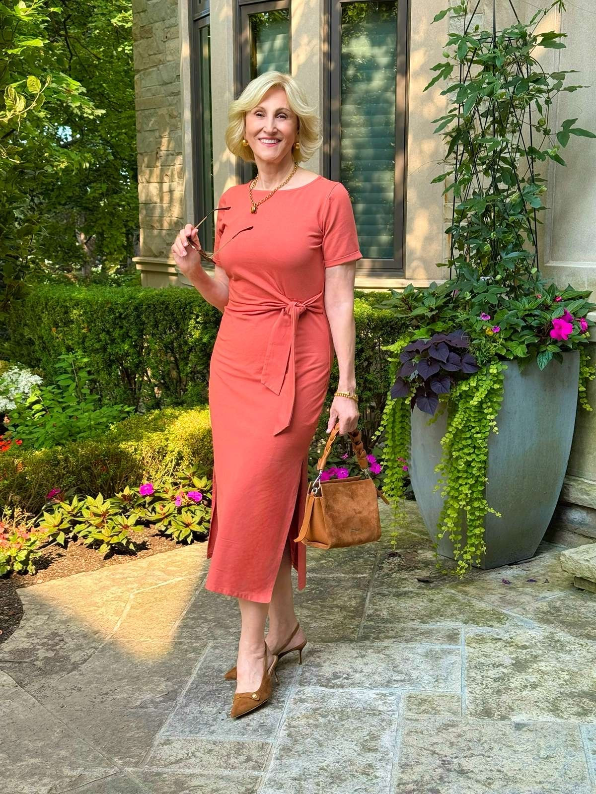 I love the rich burnt orange color of this Quince jersey-style dress, and the tie detail at the waist gives it just enough shape without feeling fussy. Paired with slingbacks, it feels polished but still comfortable and effortless.

This is definitely one of those dresses I’d reach for when I want to look put together without having to think too much about it.

#LTKSeasonal #LTKOver40 #LTKootd