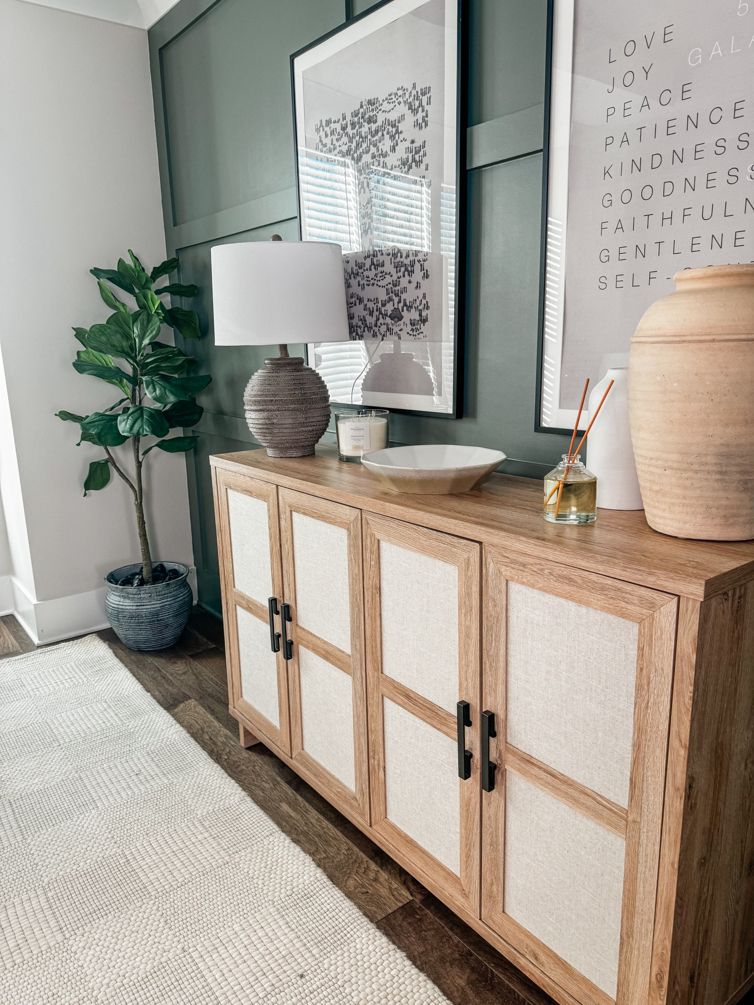 My home office! 

Console styling, home office, office accent wall, office accent, office rug, area rug, neutral rug, SW Retreat, green accent wall, large frames, large prints, office cabinets, light oak cabinet, console, console decor, office decor

#LTKhome #LTKstyletip #LTKfamily