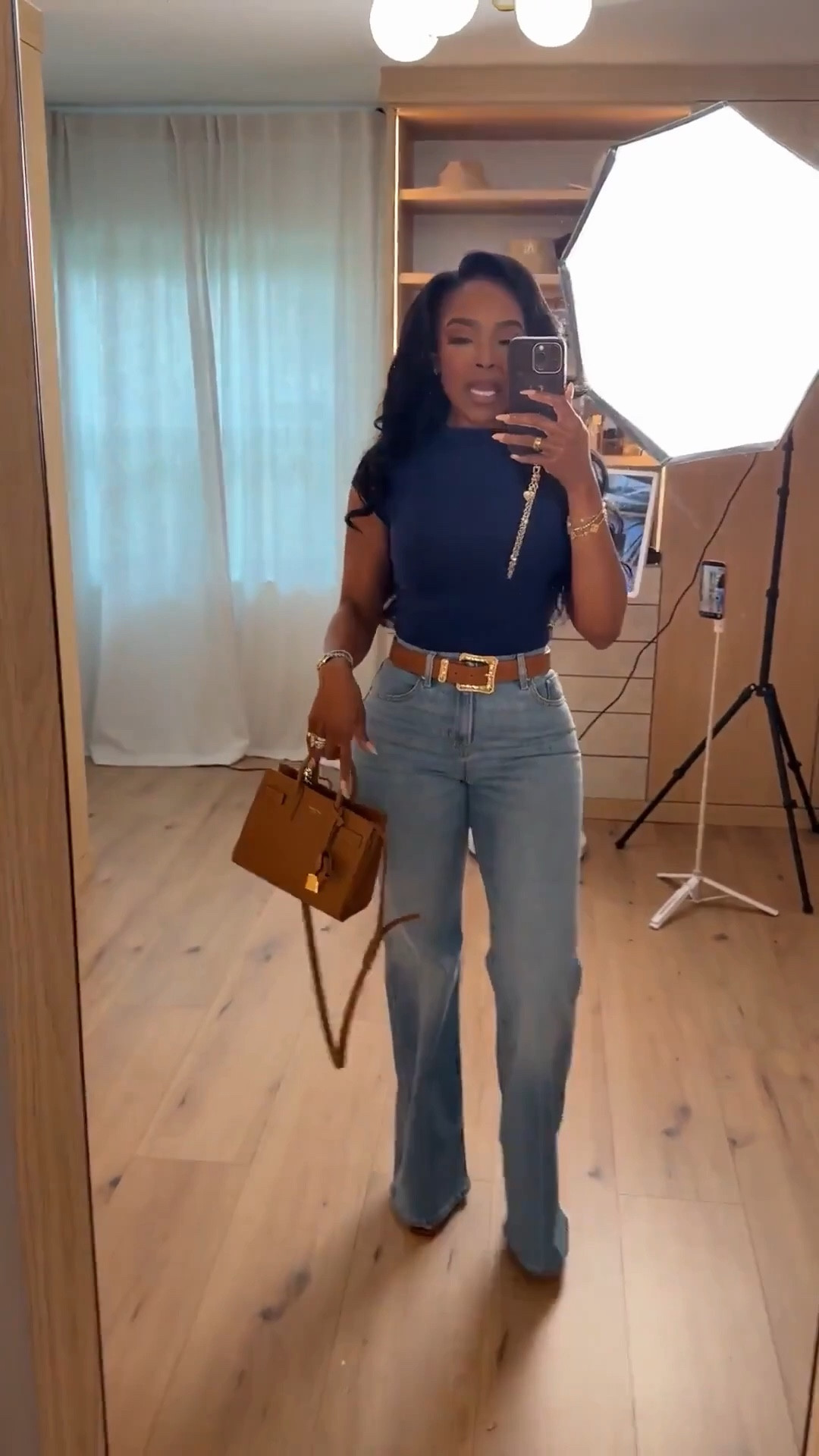 Scroll to shop 🤎  

A casual look with flare denim and a fitted navy top, giving chic, flattering, and the perfect every day look!￼￼



#LTKootd #LTKvlog