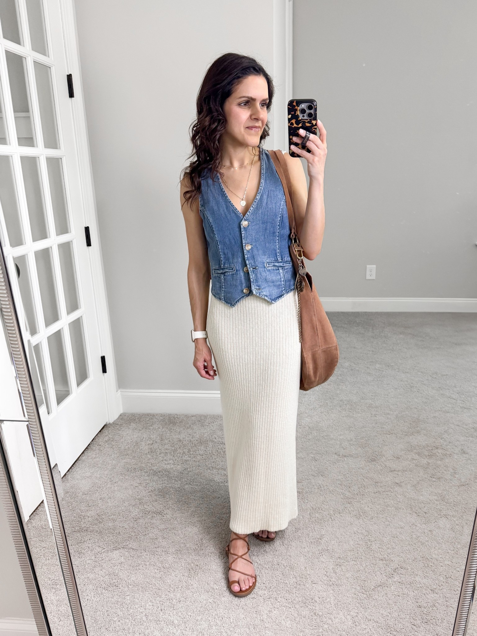 What I wore —
denim vest: Levi’s, XS
knit dress: old, linked similar
sandals: old, linked similar
suede bag: Free People 

#LTKStyleTip