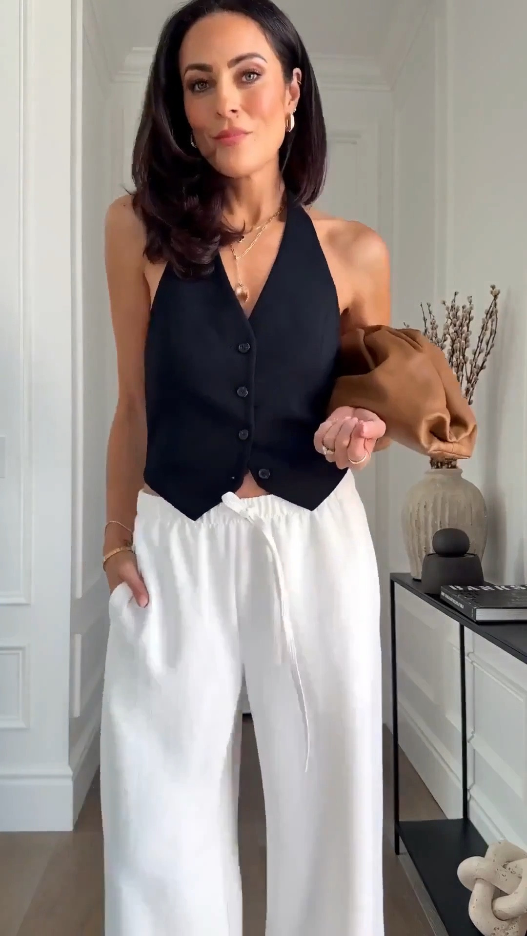 Summer essential: my favorite pull on pants! 🤍 sized up to a size small for a super relaxed fit!  These are so perfect for spring and summer! 




Summer, style, pants, vest 



#LTKSeasonal #LTKgrwm #LTKOver40