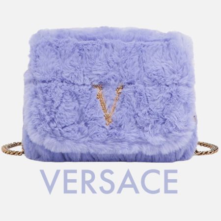 Now on sale!! 

From the Virtus Collection. Made in Italy, Versace's bag is rendered in luscious faux fur. This statement piece is highlighted with the signature Barocco letter V.
Removable chain strap
Snap closure
Goldtone hardware
Interior card slots
100% polyester
Fur Type : Faux Fur
Made in Italy

#luxurygifts #designerbags #purplebag  #versace #designergifts

#LTKsalealert #LTKGiftGuide #LTKitbag