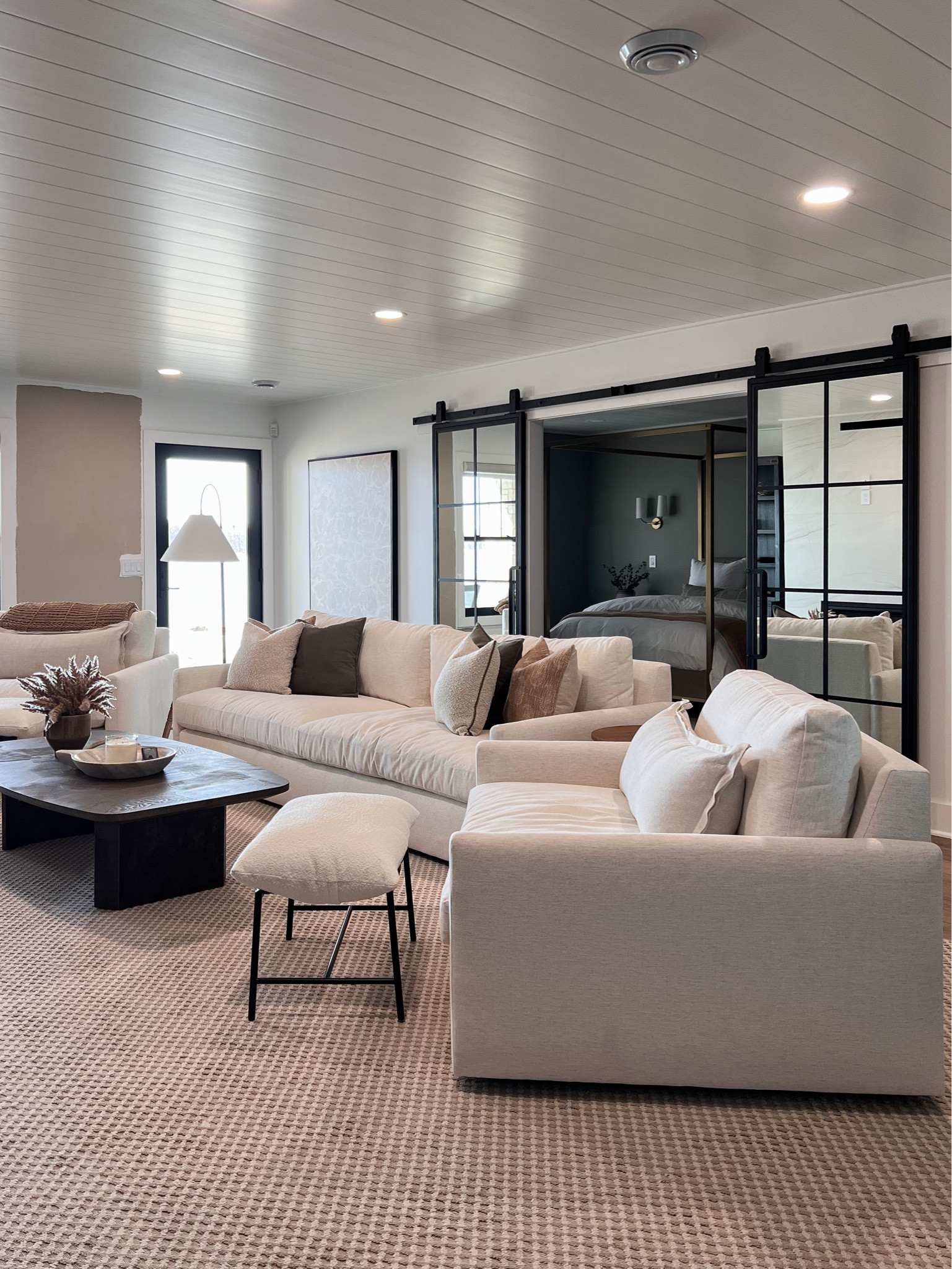 Our basement family room is coming along at the lake! Ottomans are from Denver modern. 

#LTKhome #LTKstyletip