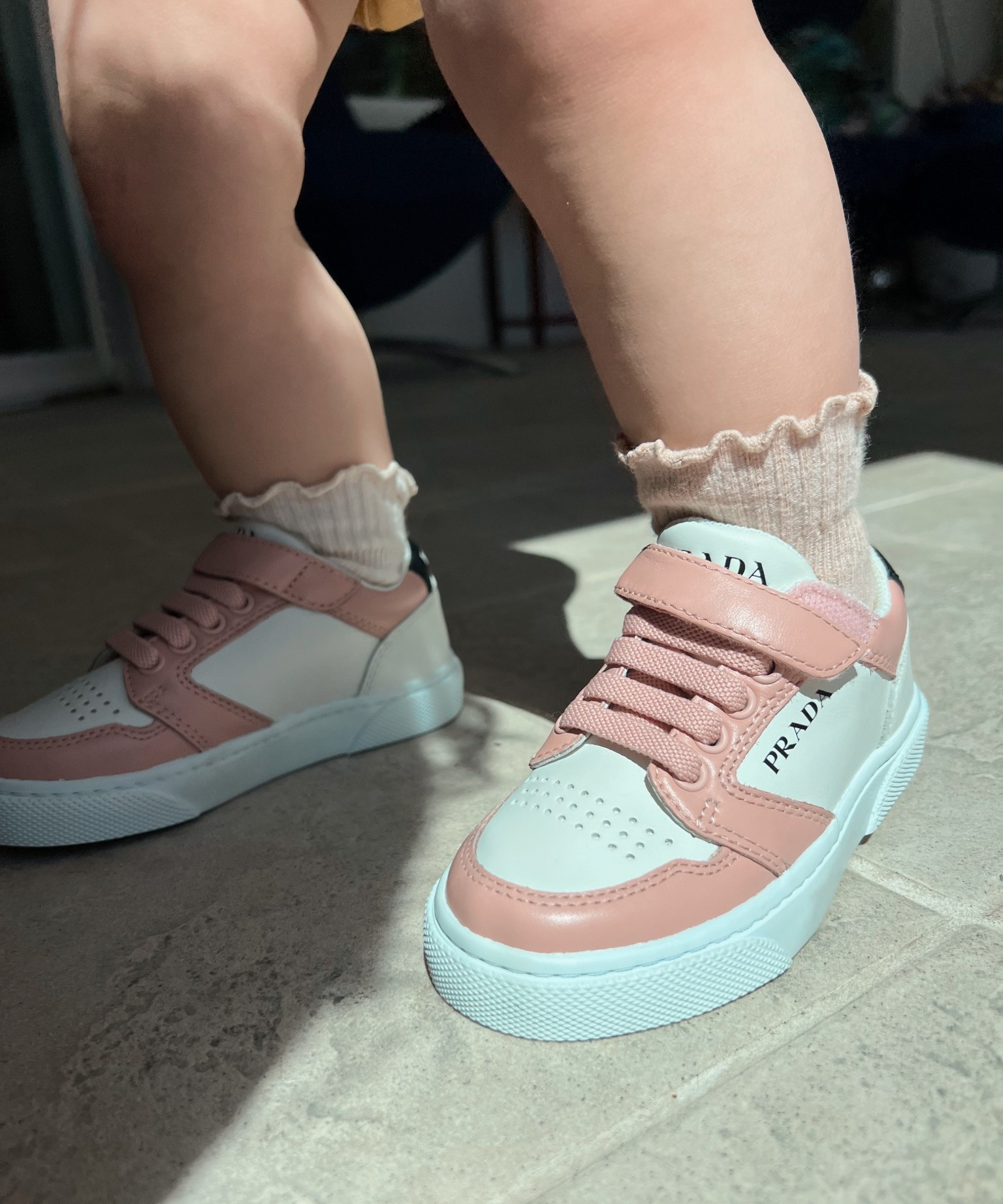 🖤🎀 Guess who discovered the kids section on @therealreal 😅 

The used designer kids stuff is all pretty much brand new since kids grow so fast but they’re priced so low 😭. These were the same price as a pair of new shoes I was going to get Chloe off amazon. I’m dying. 

#prada #pradasneakers #babygirl 