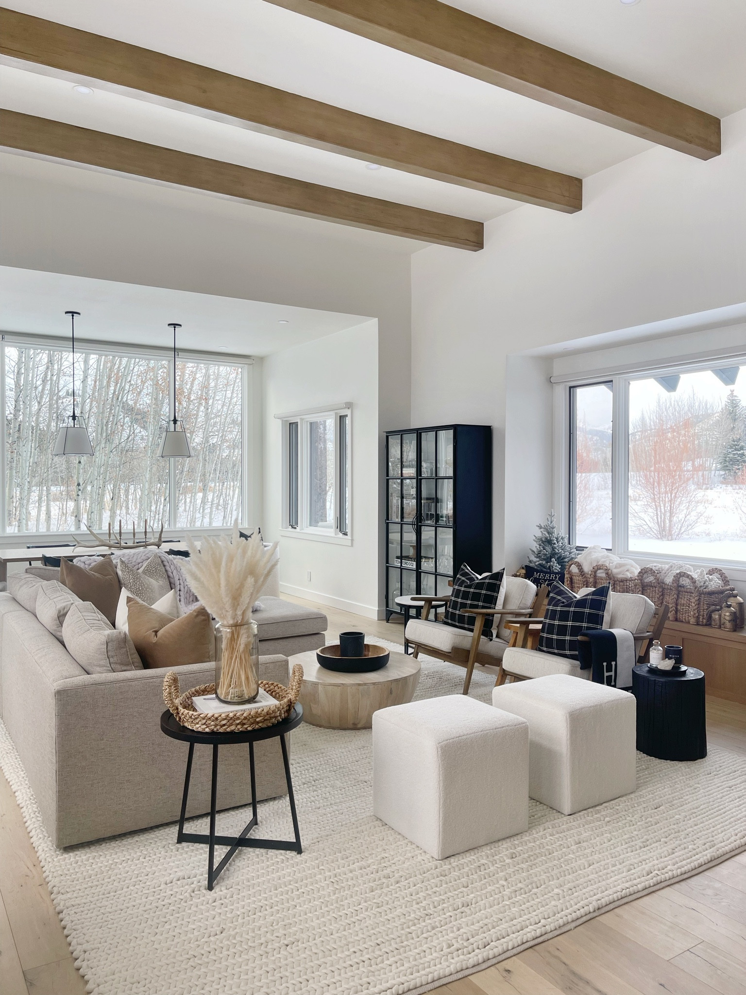 H O M E \ neutral modern country living room with pops of black🖤 New teddy cubes and a stump side table from Target!

Home decor
Sectional sofa 
Accent chairs
Coffee table 

#LTKhome