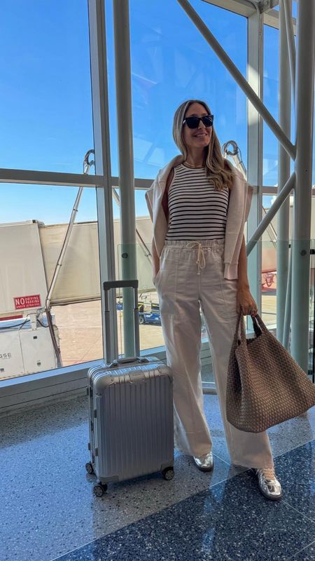 Comfy and stylish airport outfit
This sweater is from Spanx, use code ALINEXSPANX for 10% off and free shippingg
Everything fits true to size
I am wearing size small

#LTKStyleTip #LTKU #LTKTravel