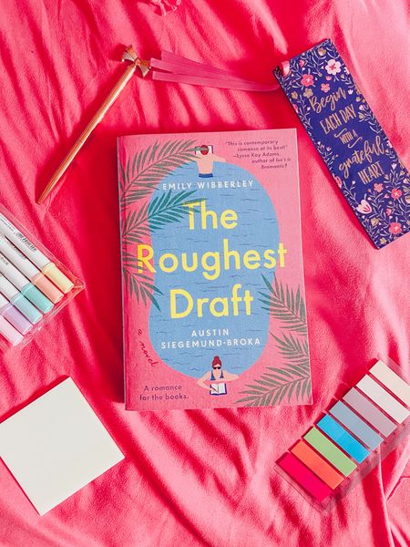📚Book Review📚

The Roughest Draft
by Emily Wibberley & Austin Siegemund-Broka
⭐️⭐️⭐️⭐️⭐️ • 5 Stars

💭Thoughts💭

The Roughest Draft is a story of two co-authors forced to reconvene after years of estrangement & write 1 last best-seller. Katrina and Nathan were literary stars until it all came to an abrupt stop & they didn't speak to each other for 3 years.

I loved that it had dual POVs & timelines so we get to see a slow reveal of the cause of the rift between them. There was some angst and built-up tension plus feelings they had never said out loud except what they had written into their books. It shaped their plot lines & defined their characters. The main characters were destined to be together, but something stopped them. The authors wanted us to find the answer by exploring each character's perspective & I loved reading it to find out the why.

I really did love so many aspects of this book, especially the concept of the plot. I loved the setting of the Florida vacation house & though I’ve never been the authors really made me feel like I was there as the 2 authors in the book were writing the final manuscript

I can describe this as a slow-burn, forced proximity, friends-to-enemies-to-lovers romance. It has angst & emotions of taking that leap from a platonic relationship to something more plus all the pressures of literary success added in.

I love books about book people, so I was intrigued. I’ve discovered I’m a fan of the forced proximity trope from the books I read lately & throw in second chance romance & I think I’ve found a new trope to swoon over.

It's true what they said when I stumbled upon this that it had the same vibe of Beach Read. That’s why I picked it up.

I recommend this as it reminds me of Beach Read & a mix of People We Meet on Vacation (just with more angst!) So if you’re a fan of those 2 Emily Henry books than for me it’s similar.