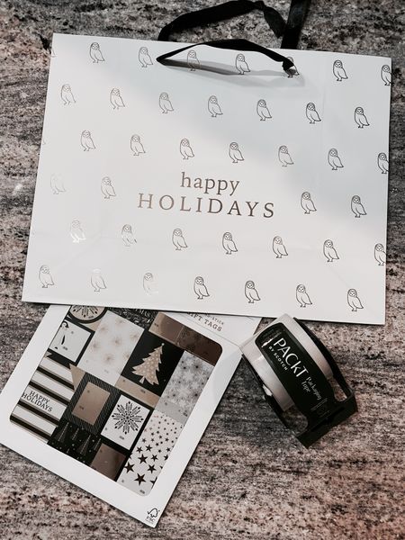 The cutest gift wrapping supplies: white and gold gift bag, white, gold, and black gift tag stickers, and packing tape in case your gift is big. 😉

#LTKHoliday #LTKeurope #LTKunder50