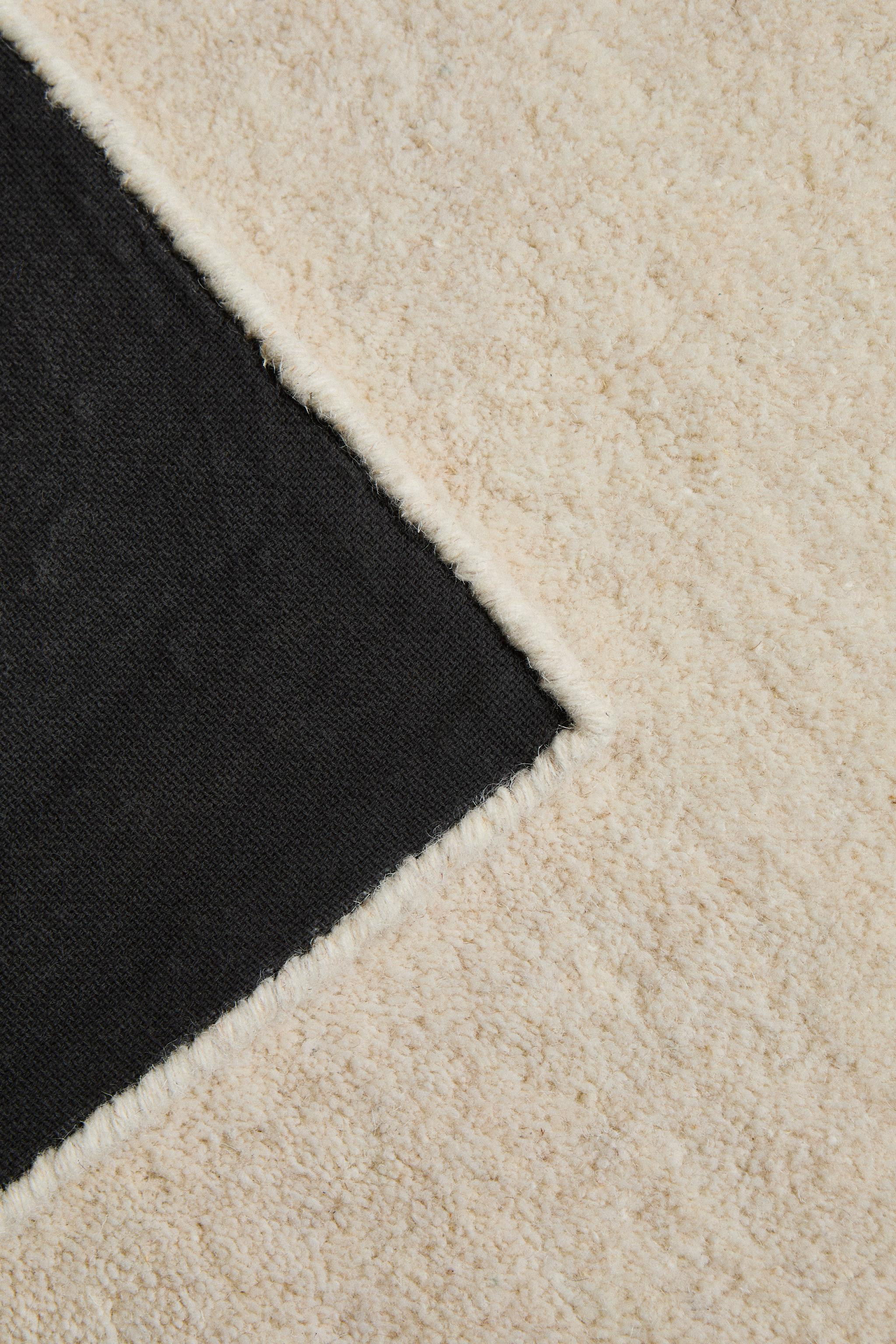 LARGE SEMI-CIRCLE WOOL AND COTTON AREA RUG | Zara US