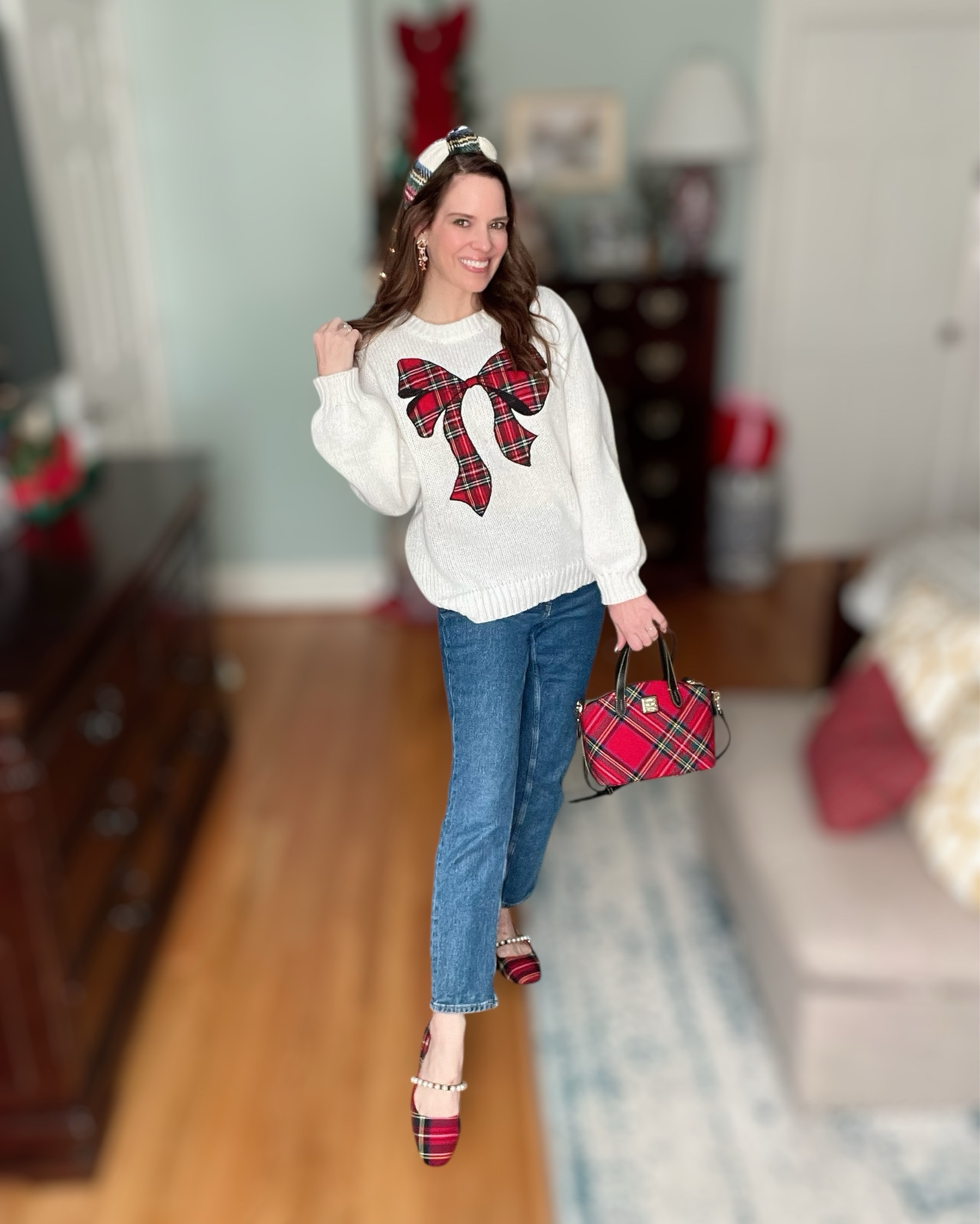 Tartan Bow Holiday Outfit 🎁❤️✨

The sweetest Christmas look with all the tartan details — this cozy bow sweater is such a festive statement piece and pairs perfectly with classic denim for an easy holiday outfit. I added my tartan padded headband, gingerbread earrings, the cutest Dooney & Bourke plaid satchel, and tartan flats with pearl trim to tie it all together. The coziest, happiest December look for parties, cookie baking, school events, or just bringing a little cheer to the day! 🎁✨🎄

holiday outfit inspo • tartan Christmas outfit • plaid bow sweater • festive December style • classic holiday fashion • Christmas headband • Dooney & Bourke tartan bag • holiday earrings • Christmas flats • cozy winter outfit ideas • girly holiday aesthetic 🎀

#LTKHoliday #LTKFindsUnder50 #LTKGiftGuide
