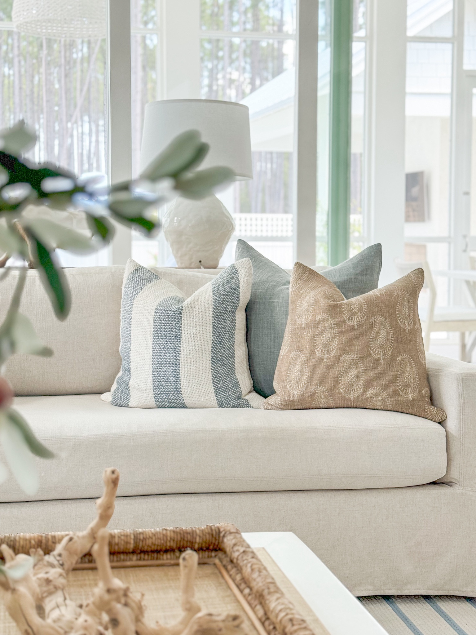 Our living room decorated for fall! Includes our linen sofas, striped rug, paisley throw pillows, faux olive stems, raffia coffee table, white ceramic lamps, acrylic side tables and more!
.
#ltkhome #ltkseasonal #ltkvideo #ltksalealert #ltkstyletip #ltkfindsunder50 #ltkfindsunder100 coastal fall decor

#LTKSeasonal #LTKHome #LTKSaleAlert