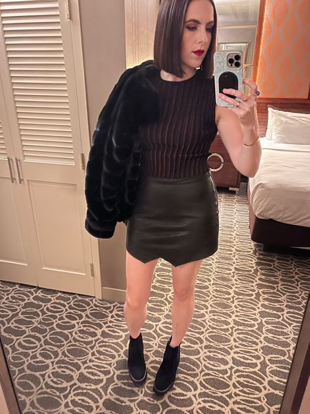 Vegas Outfit #1 - First night in Vegas and I picked a leather skirt, a top & jacket from Marine Layer, & Blondo boots for the Usher concert  

#LTKfit #LTKtravel #LTKSeasonal