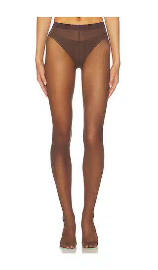 Wolford Individual 20 Tights in Brown. - size L | Revolve Clothing (Global)
