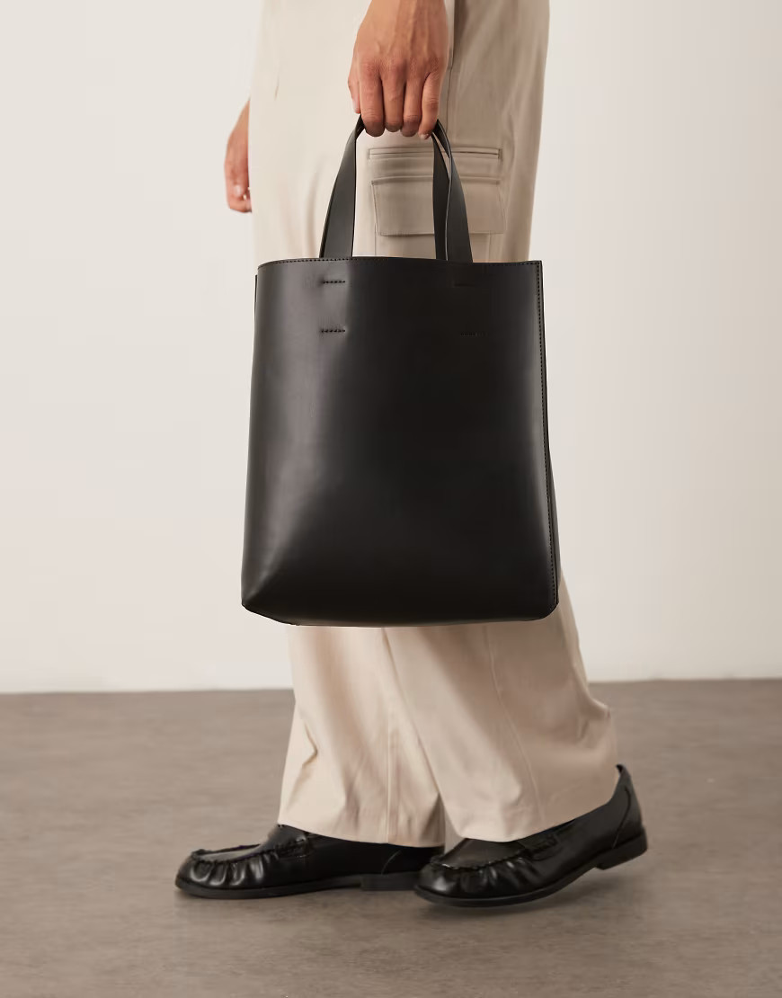 ASOS DESIGN faux leather tote bag with crossbody strap in black | ASOS (Global)