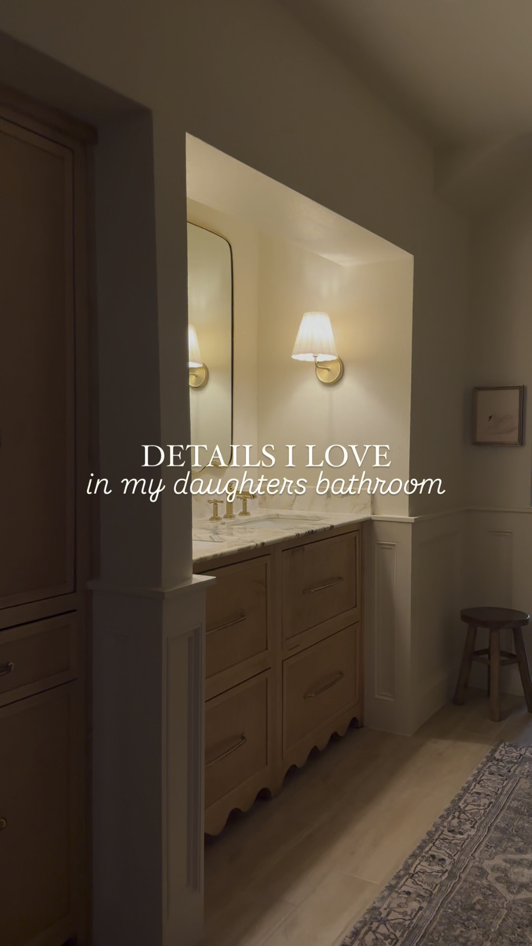 Bathroom Renovation details, sconces, scalloped mirror, aged brass drawers pulls / knobs, laundry hamper, rug, framed art, stool 

#LTKVideo #LTKxWayDay #LTKHome