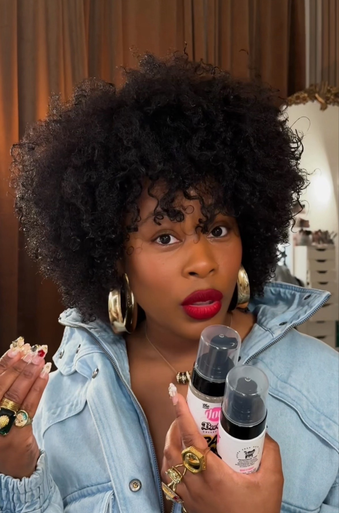 This look is all about balance, bold hair, minimal makeup, effortless styling.

I styled my wolf cut using two styling foams from The Doux and this was hands down the fastest, easiest wash and go I’ve ever done. My curls came out defined, hydrated, and set without a complicated routine. If you’re looking for natural hair products that save time but still give volume and hold, this combo is it.

Because the hair is doing the most, I kept the makeup minimal, lightweight base, soft skin, and a classic red lipstick to finish it. When your cut has movement and shape like this, you don’t need much else.

The denim jacket is a true staple piece. Structured, slightly oversized, and easy to dress up or down. You can pair it with heels and a bold lip for an elevated look, or throw it on with sneakers for an effortless everyday outfit. It’s one of those pieces that instantly pulls everything together.

Everything linked here hair, makeup, red lip, and jacket.

#LTKBeauty #LTKvlog #LTKgrwm