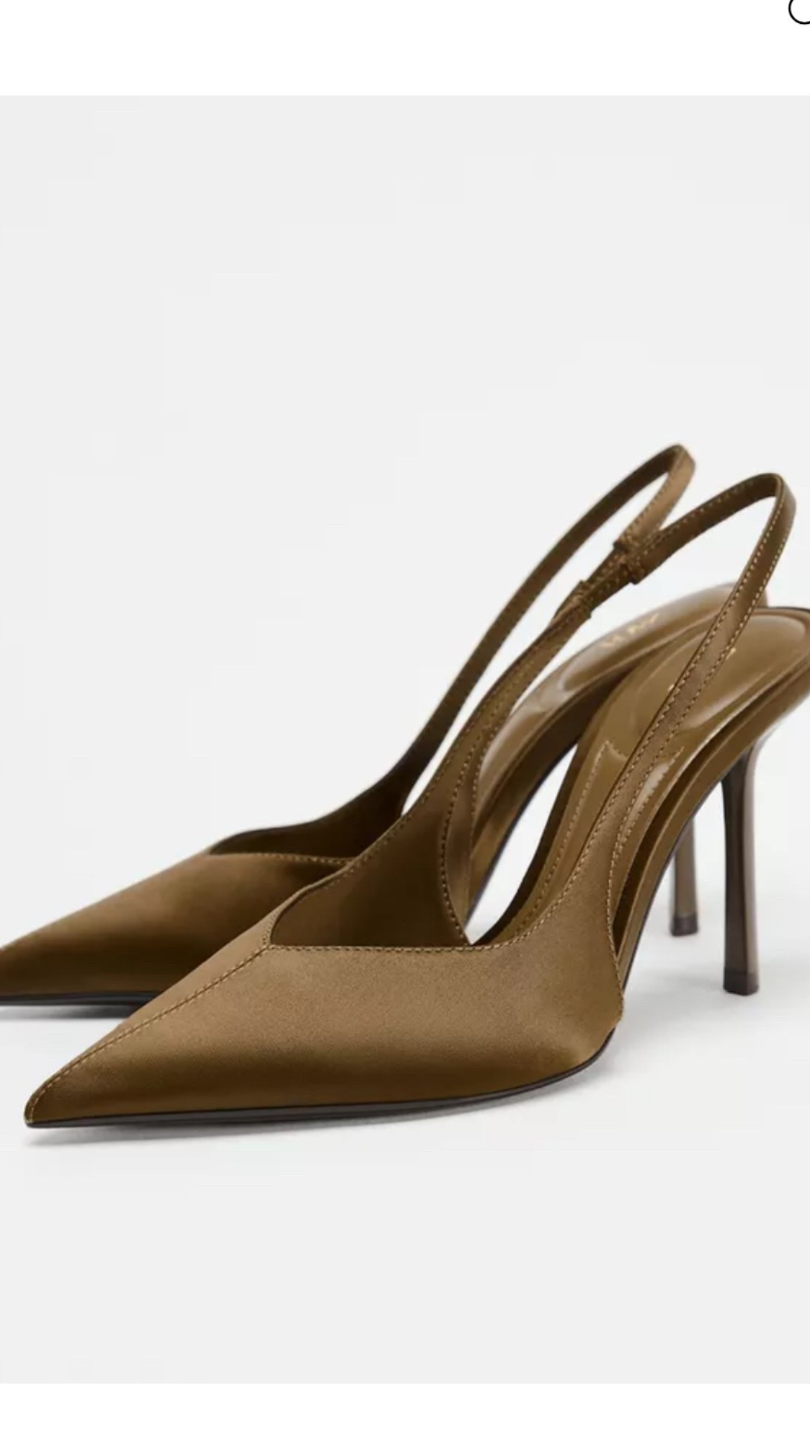 
SATIN EFFECT HEELED SLINGBACKS

Satin effect slingback heels. Contrasting topstitching detail at exterior. Back strap with elastic piece. Pointed toe.

Heel height: 3.9 inches (10 cm)
KHAKI GREEN | 2206/510/032

#LTKParties #LTKWedding #LTKShoeCrush