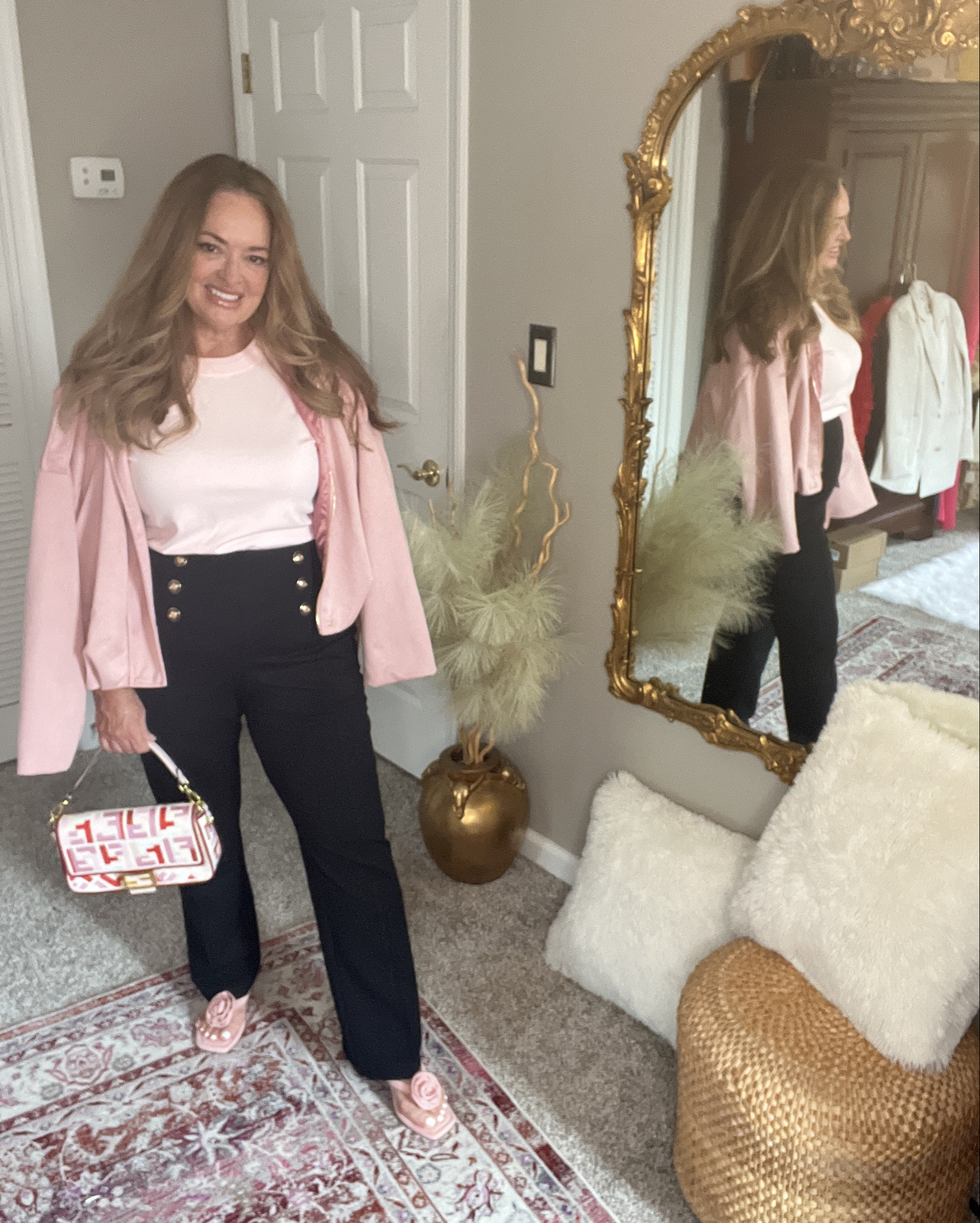 Black high waisted sailor pants with baby pink. 

#LTKOver40 #LTKWorkwear #LTKMidsize