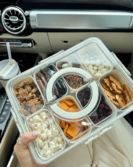 AMAZON TRAVEL FIND 🚙 this snack tray is great for roadtrips! It holds up to 8 snacks (including divider cups), snaps shut, and includes a handle for easy travel! 

Travel, Amazon Travel, Travel Finds, Amazon Travel Finds, Roadtrip Finds, Snack Tray, Amazon Finds, Madison Payne 

#LTKSeasonal #LTKStyleTip #LTKTravel