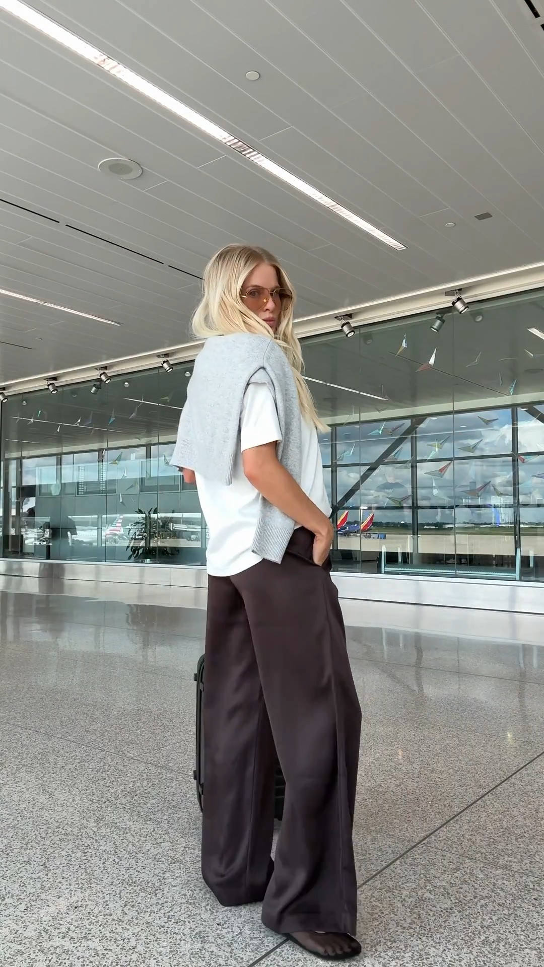 SIZE: small in tee, medium in sweater (heather chrome), small reg in pants (rich mocha brown), linked similar shoes! #kathleenpost

travel outfit, airport outfit, elevated everyday outfit, satin pants styling, casual chic style

#LTKootd #LTKTravel