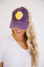 YELLOW PAW PRINT HAT ON PURPLE | Judith March