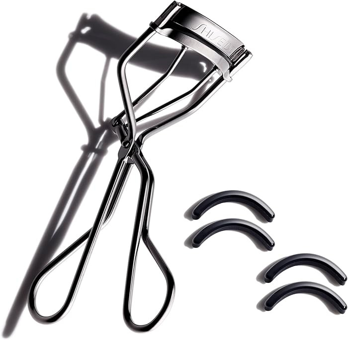 Shiseido Eyelash Curler + Two Sets of Eyelash Curler Replacement Pads (4 Pads Total) - Crimps & C... | Amazon (US)