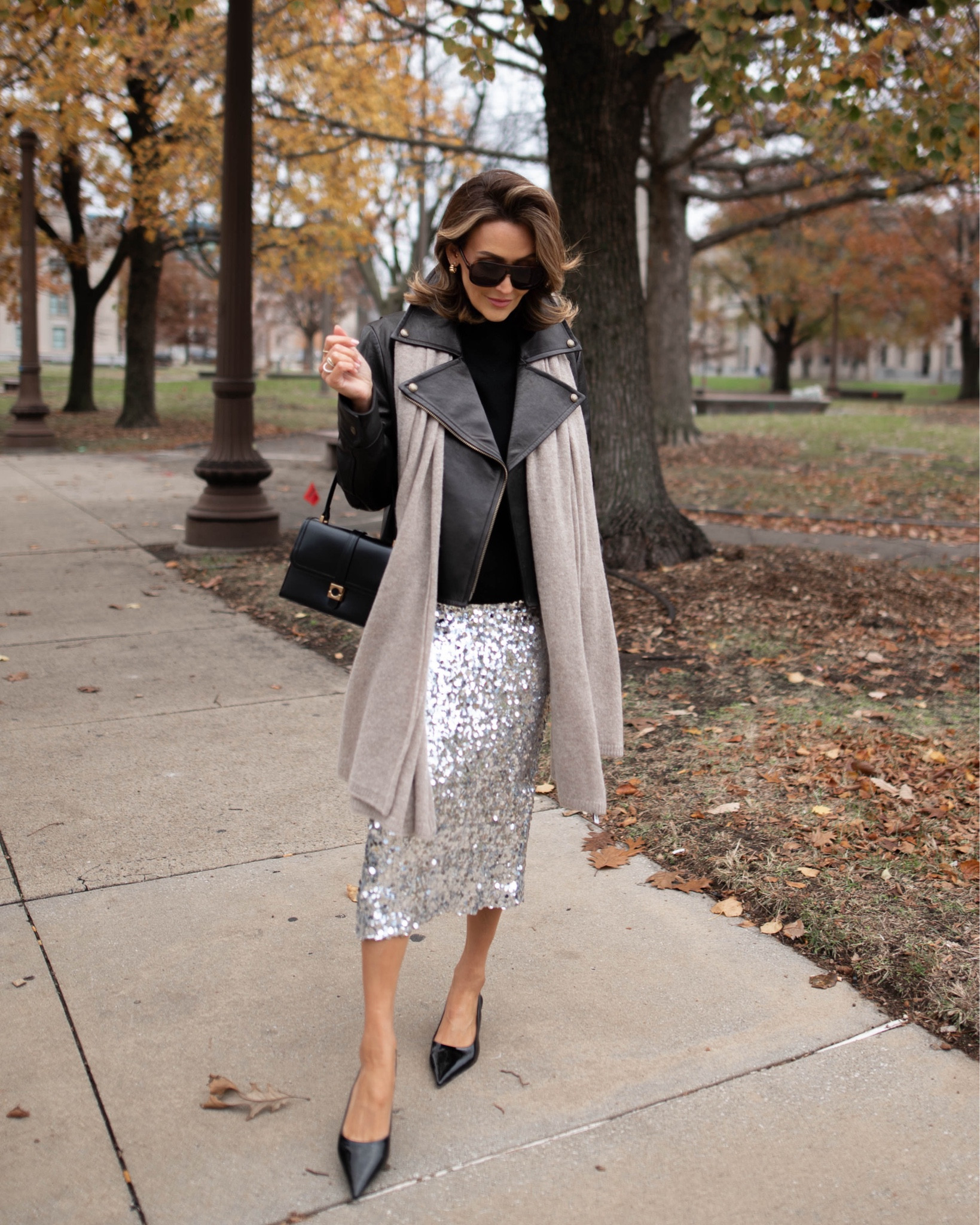 How to style a sequin skirt 
Skirt and bag on sale up to 50% off no coupon needed 
Black cashmere sweater and scarf on sale 
Leather jacket motorcycle style xs 
Sling back shoes 

#LTKHoliday #LTKStyleTip #LTKCyberWeek