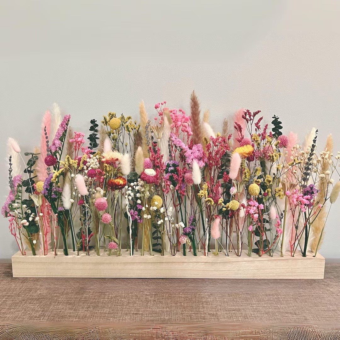 Bring a touch of nature indoors with this dried flower wood bar wall hanging featuring a beautiful mix of everlasting wildflowers and grasses. Designed as a botanical piece of art, this versatile arrangement can be styled on a wall, windowsill, or tabletop for effortless charm. With over 15 varieties of dried blooms and customizable color options, this unique flower bar adds long-lasting beauty to baby showers, bridal events, or everyday home décor.

#LTKHome #LTKFinds #DriedFlowers #WallDecor #BotanicalDecor #HomeDecor #FloralDecor #EverlastingFlowers #FarmhouseStyle #BohoDecor #SpringDecor #HomeInspiration #RusticDecor #WeddingDecor #BabyShowerDecor 

#LTKWedding #LTKHome #LTKSeasonal