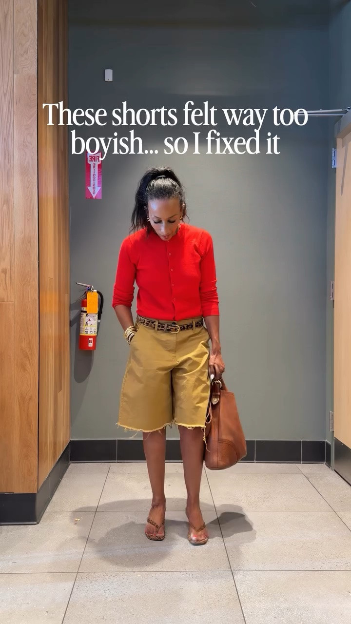 The problem with these shorts is how boyish they can feel on their own..So instead of changing them… I balanced them

A bright red crew neck cardigan worn as a top softens everything and gives the look shape

Then I added leopard kitten heels and a matching belt
just enough to pull it all together

It’s always about balance

Comment SHOP and I’ll send everything

#LTKootd #LTKmomlife