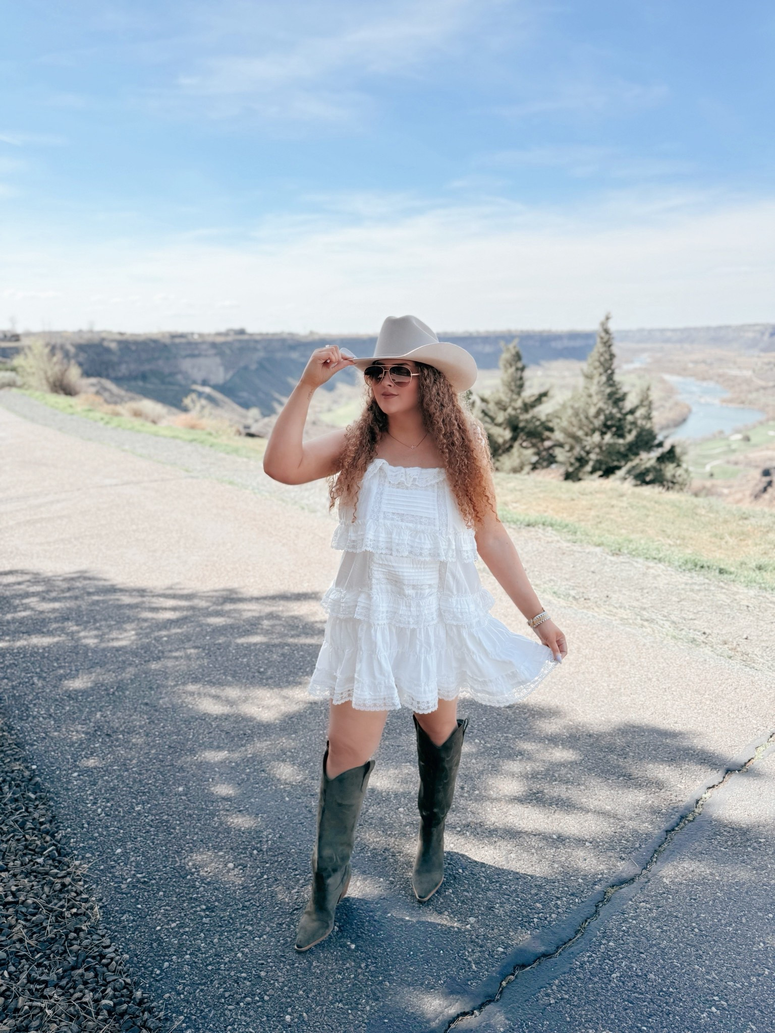 A little lace, a little western 🤍 Nothing beats a flowy romper and boots moment with a view like this. ☀️ Soft, feminine, and just the right amount of bold 🌵✨ spring outfit | western outfit inspo | cowgirl style | boho western outfit | lace romper outfit | white romper outfit | feminine spring style | western chic look | cowgirl boots outfit | green boots outfit | beige cowboy hat | wide brim hat outfit | desert outfit inspo | canyon outfit | boho outfit | festival outfit inspo | spring boho look | country concert outfit | neutral western style | statement boots outfit

#LTKdayinmylife #LTKMidsize #LTKootd