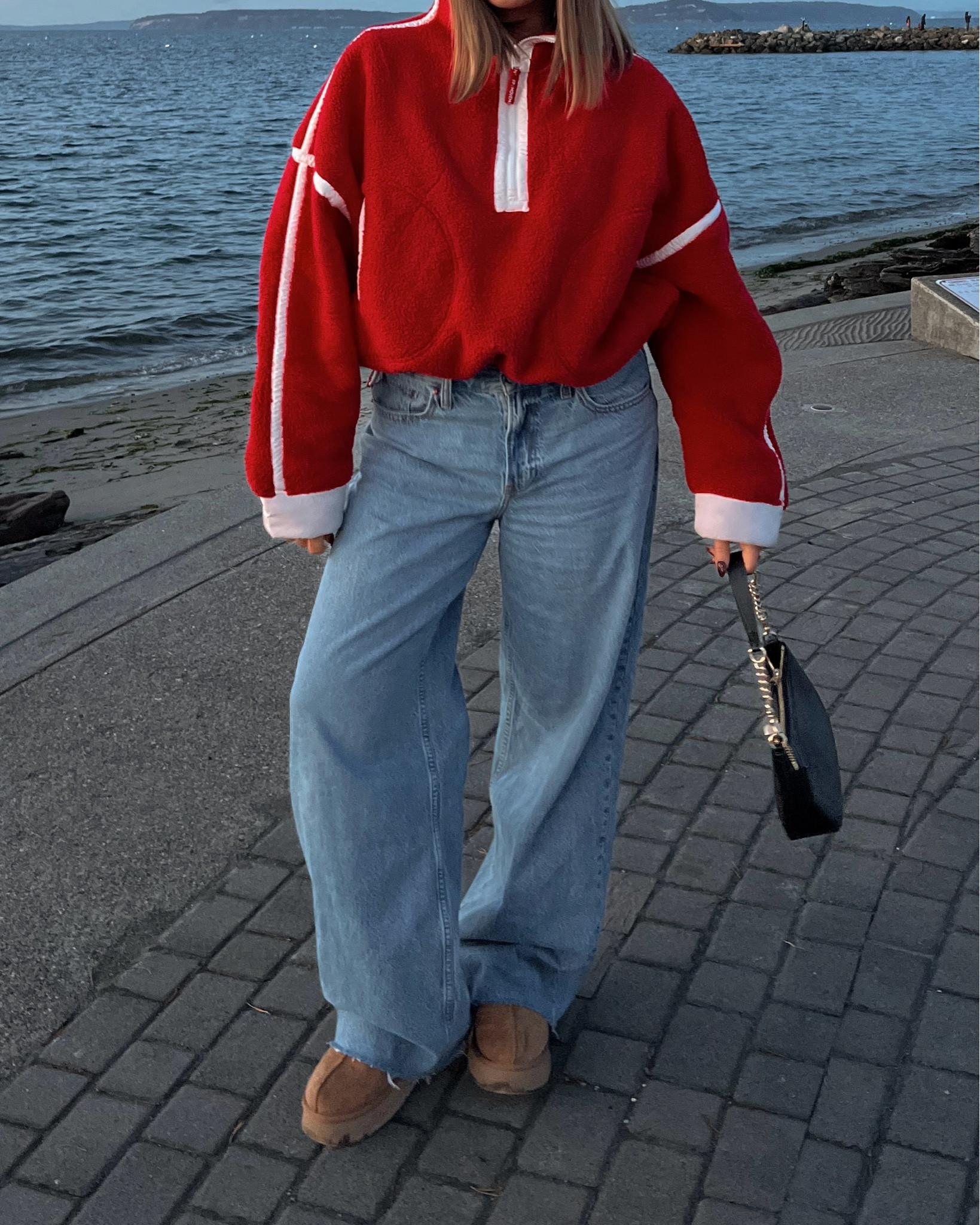 Free people movement fleece sherpa is so cute and cozy size L I went up one size for a looser fit but true size is fine!! Jeans you can size down they are low rise and loose and sooo cute omg the softest denim such a great price too!!! Uggs run true to size don’t size down!