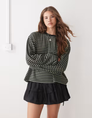 Lioness Bloom cotton blend long sleeve crew neck boxy t-shirt in green & black stripes | ASOS (Global)