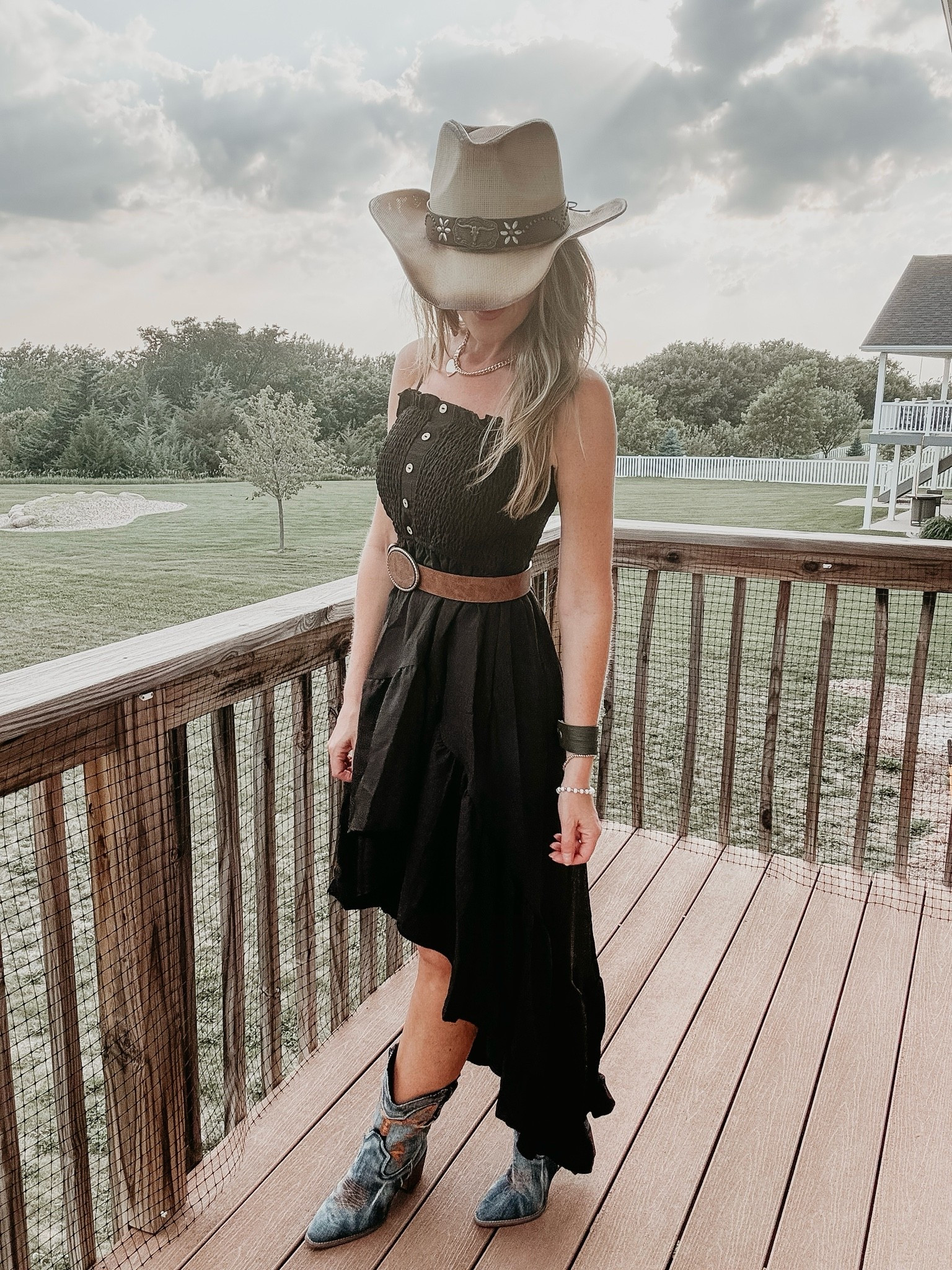 Country concert outfit inspo 🎶 Loving this black strappy dress with asymmetrical ruffle hem line! 🖤 Pairs so well with the brown belt and denim boots! Wearing a small in the dress.

As an Amazon Influencer I earn commission on qualifying purchases.

Black dress for a country concert, summer concert outfit idea, festival look, country concert vibes, date night look, Midwest fashion, cowboy hat, denim boots, country concert outfit idea

#LTKTravel #LTKootd #LTKMidsize