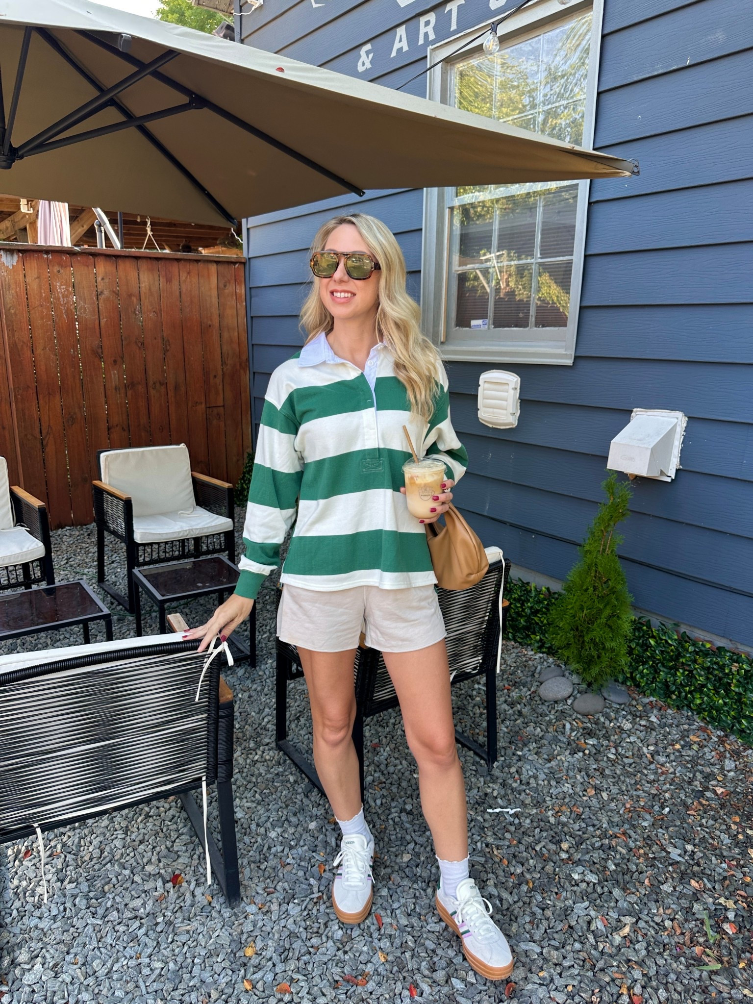 These sunnies come in a two pack where you can pick the color combos for under $15! I love the shape of them ✅ My shirt is available in super limited sizes but a couple other color options still! Rugby ones are on-trend so it’s going fast 💨 The purse is a buy from a while ago and it is on major markdown for final sale! #rugbyshirt #sunglasses 

#LTKFindsUnder50 #LTKFindsUnder100 #LTKSeasonal