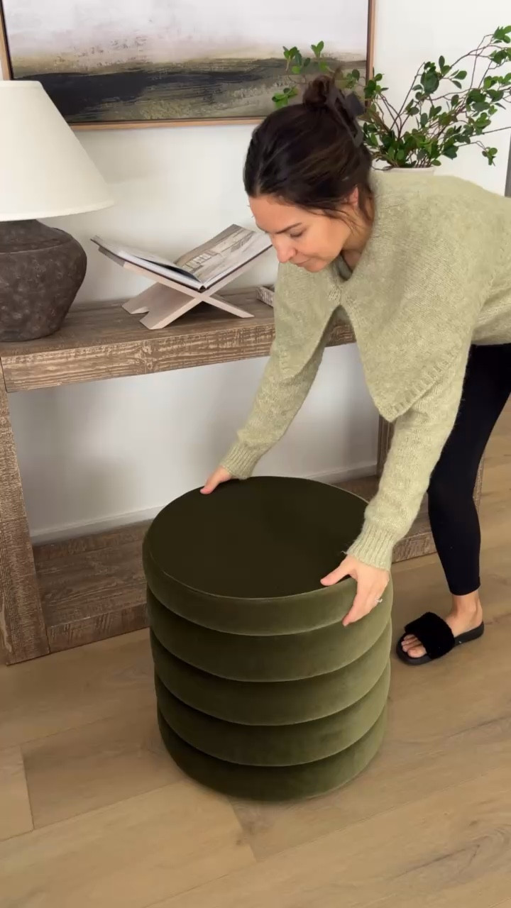 Modern organic console table decor with the perfect upholstered green ottomans with storage