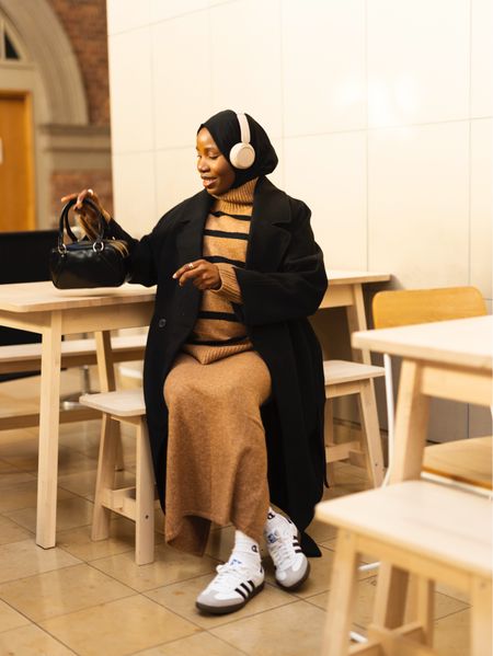 Striped jumper and skirt look perfect for winter errands. 

#LTKshoecrush #LTKstyletip #LTKbump